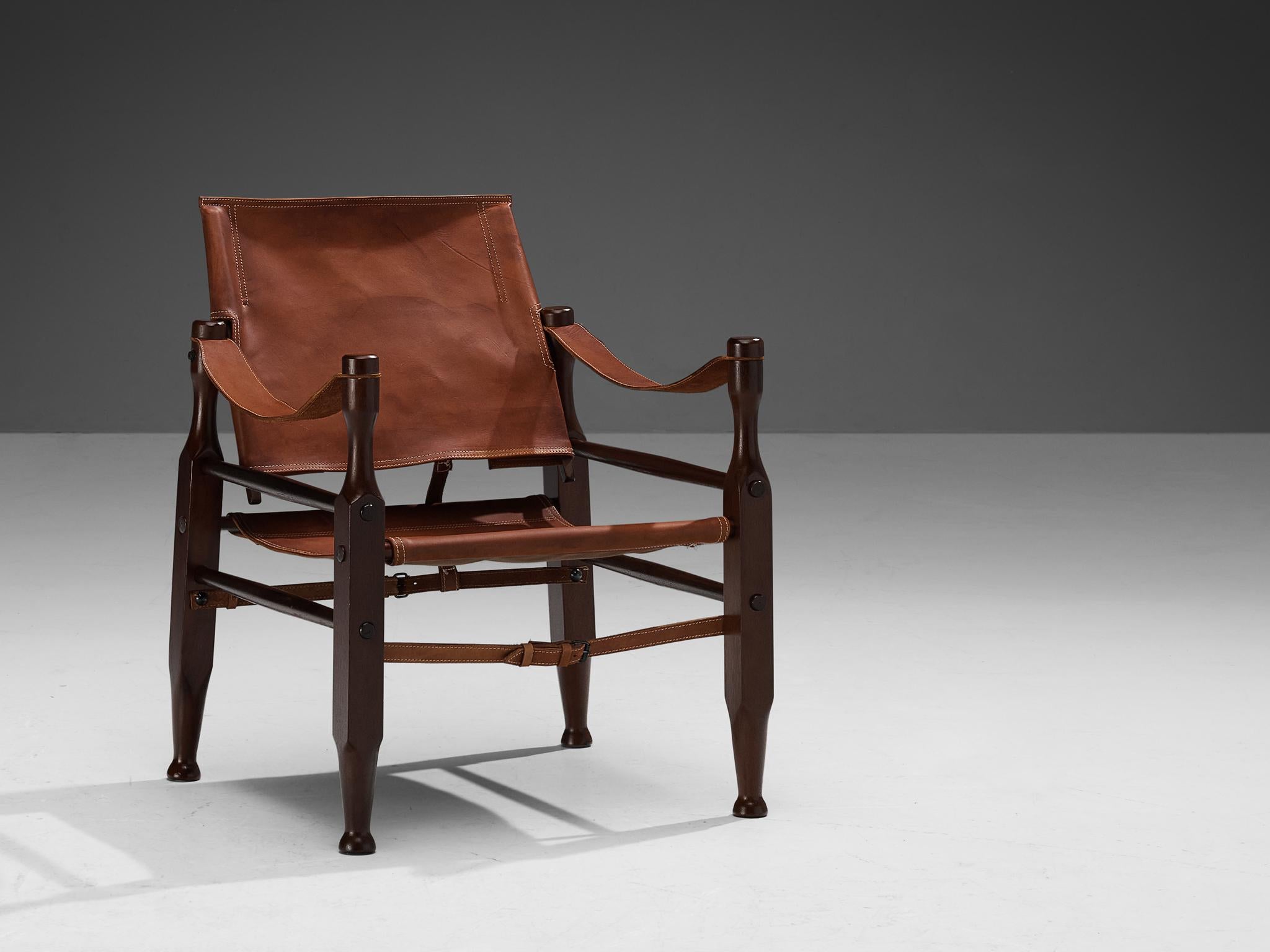 Chaise longue Safari, cuir, hêtre teinté, métal chromé, Europe, 1970

Superbe chaise longue safari recouverte d'un revêtement original en cuir naturel brun cognac. La chaise présente des lignes très élégantes et bien conçues, en combinaison avec