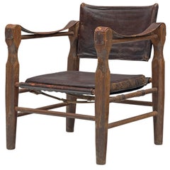Fauteuil Safari avec cadre sculptural en cuir brun patiné
