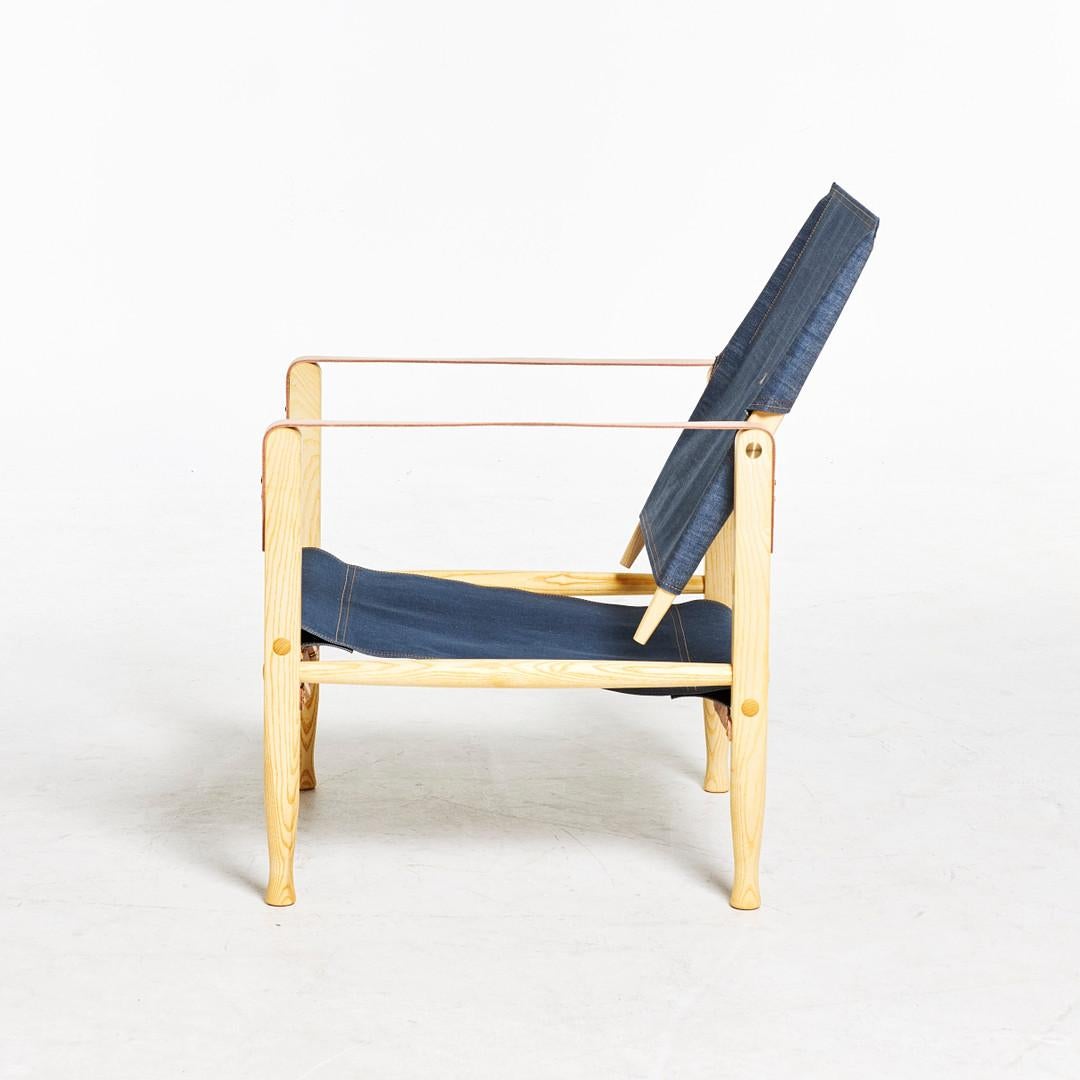 The Safari armchair designed by Kaare Klint is an outstanding example of elegance and functionality in the world of furniture design. This special edition combines timeless craftsmanship with contemporary materials to create a unique and distinctive