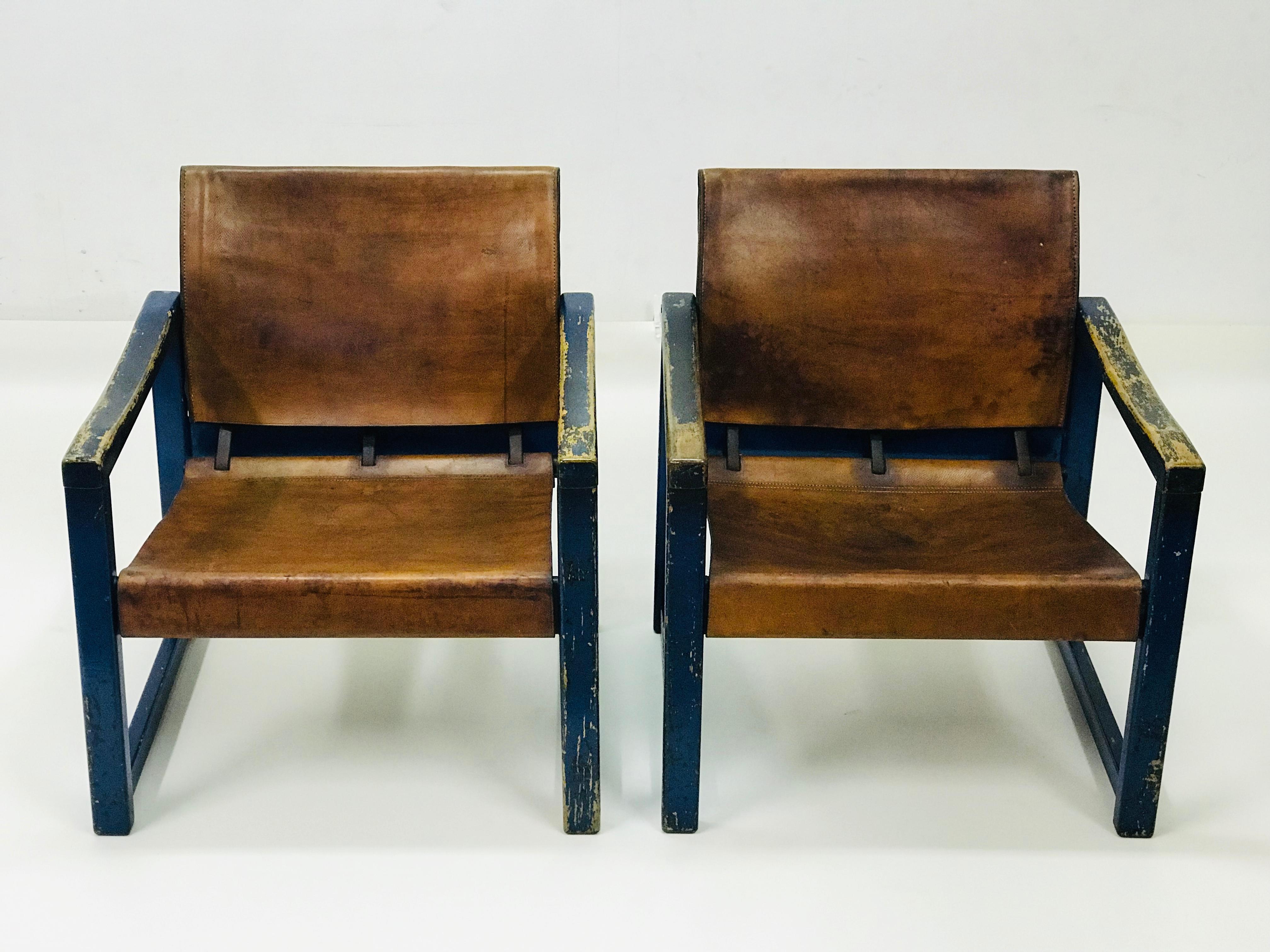 The chairs is designed by Karin Mobring and it was made in the year 1970. The chairs have got a stabile frame and the sitting part is made of the massive leather. These ones are preserved condition, useful, slightly wood cuts and the patina leather.