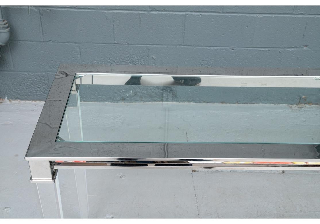 Safavieh Charleston Stainless And Glass Console Table With Acrylic Legs In Fair Condition For Sale In Bridgeport, CT