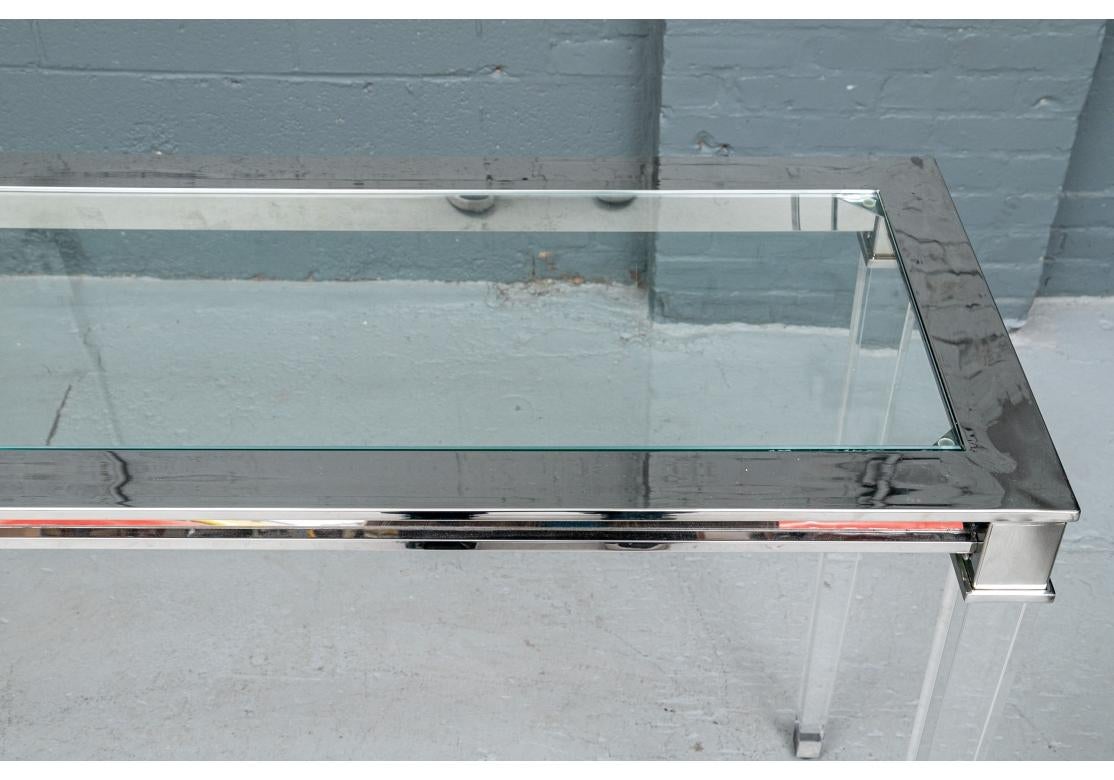 Contemporary Safavieh Charleston Stainless And Glass Console Table With Acrylic Legs For Sale
