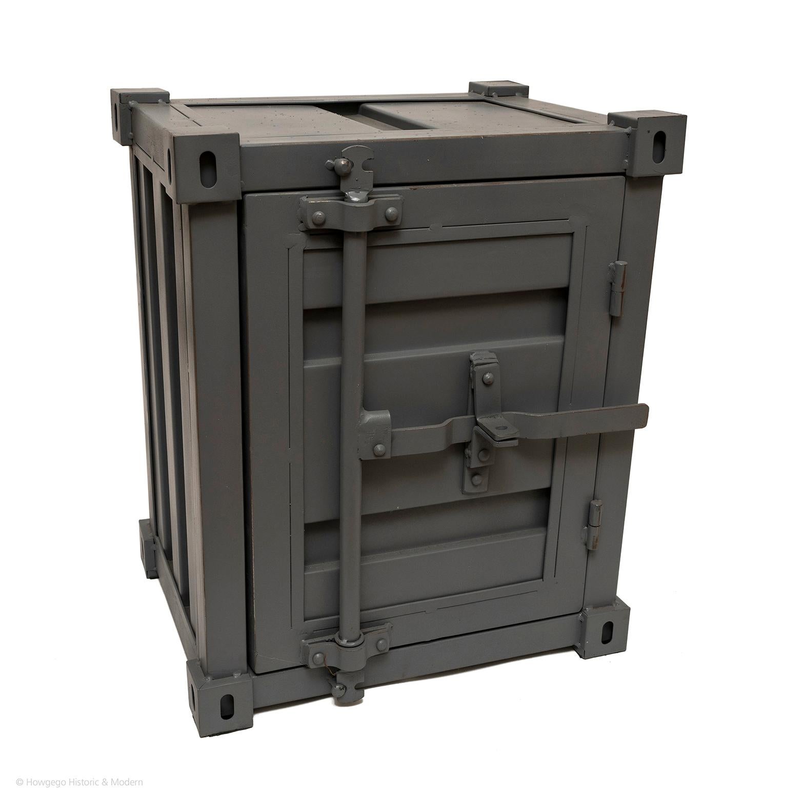 Dual purpose can serve as a safe and sidetable
Stylish conversation piece for the interior
The central bar locks the safe which could be secured with a padlock.  
The inside cupboard with shelf

Length 46cm., 18