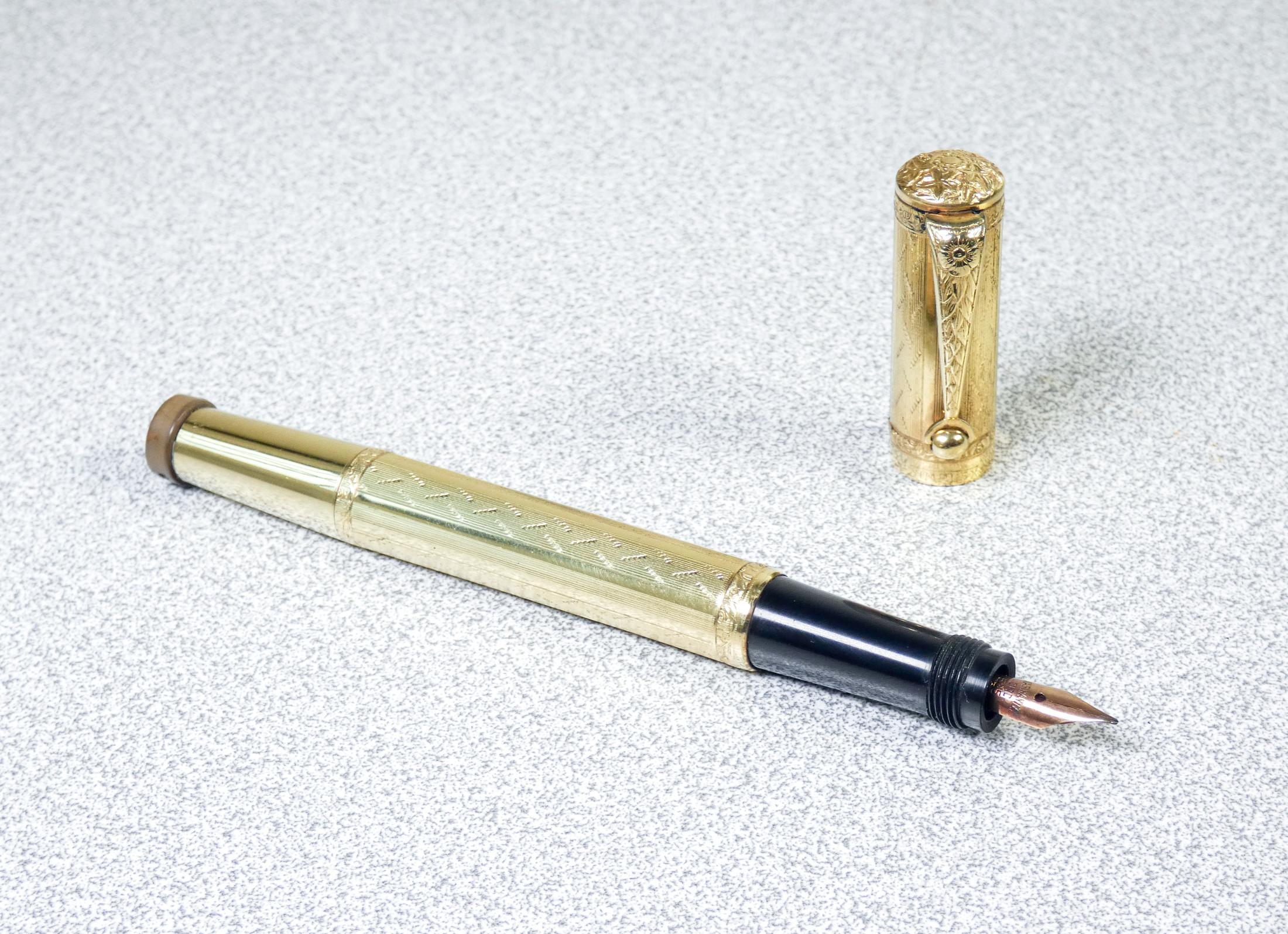 Safety fountain pen with retractable nib. SIMPLEX, gold laminated

PERIOD
1920s

BRAND
Simplex

MODEL
Fountain pen with retractable nib, safety

MATERIALS
Ebonite, gold laminated

DIMENSIONS
120 mm

CONDITIONS
The pen is in very