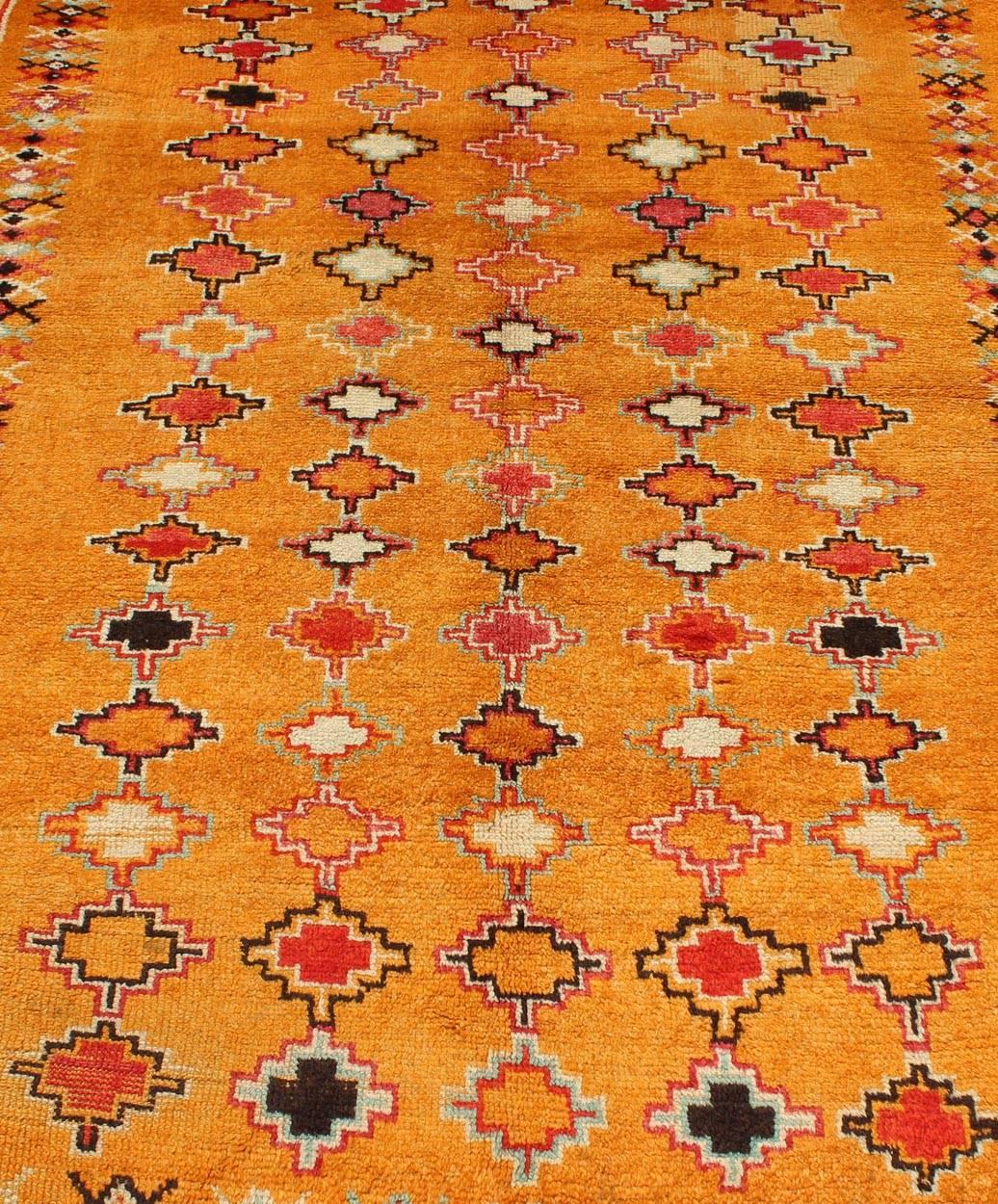 Wool Saffron Colored Antique Moroccan Carpet with Geometric and Diamond Pattern  For Sale