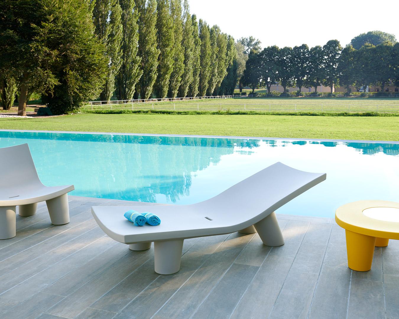 Saffron Yellow Low Lita Lounge Chaise Longue by OTTO Studio
Designed by Paola Navone.
Dimensions: D 79 x W 175 x H 60 cm. Seat Height: 36 cm.
Materials: Polyethylene.
Weight: 25 kg.

Available in different color options. This product is suitable for