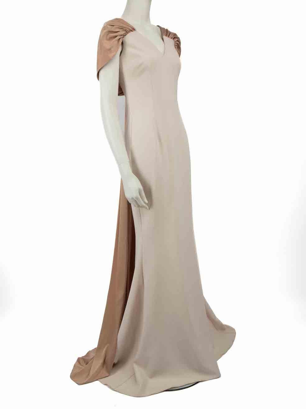 CONDITION is Very good. Minimal wear to dress is evident. Minimal wear to the fabric surface with some mild discolouration seen at the hem on this used Safiyaa designer resale item.
 
 Details
 Beige
 Polyester
 Gown
 Sleeveless
 V-neck
 Maxi
 Satin