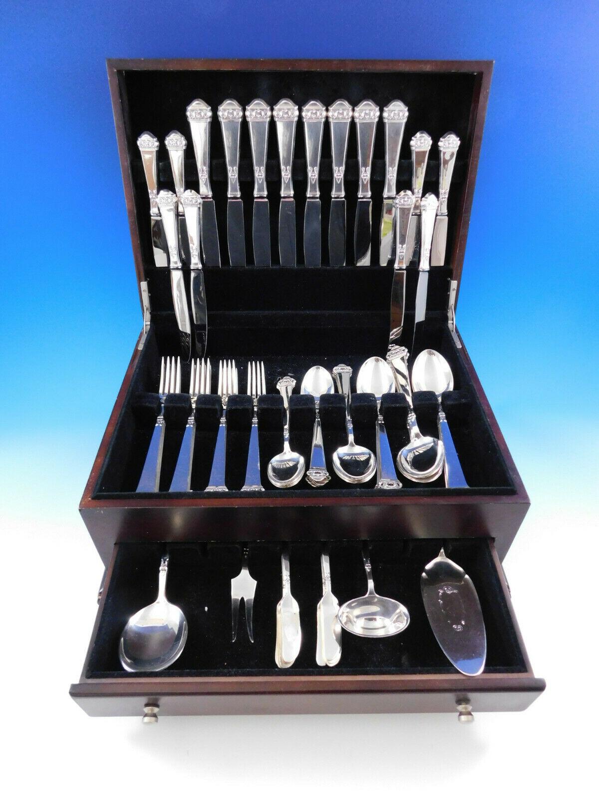 Superb Saga by Mylius Brodrene 830 silver Norwegian flatware set, 69 pieces. The company began in 1932 in Krager, in the south of Norway and closed its doors in 2008. This pattern has a pierced finial on a plain squared handle. This set includes:

8