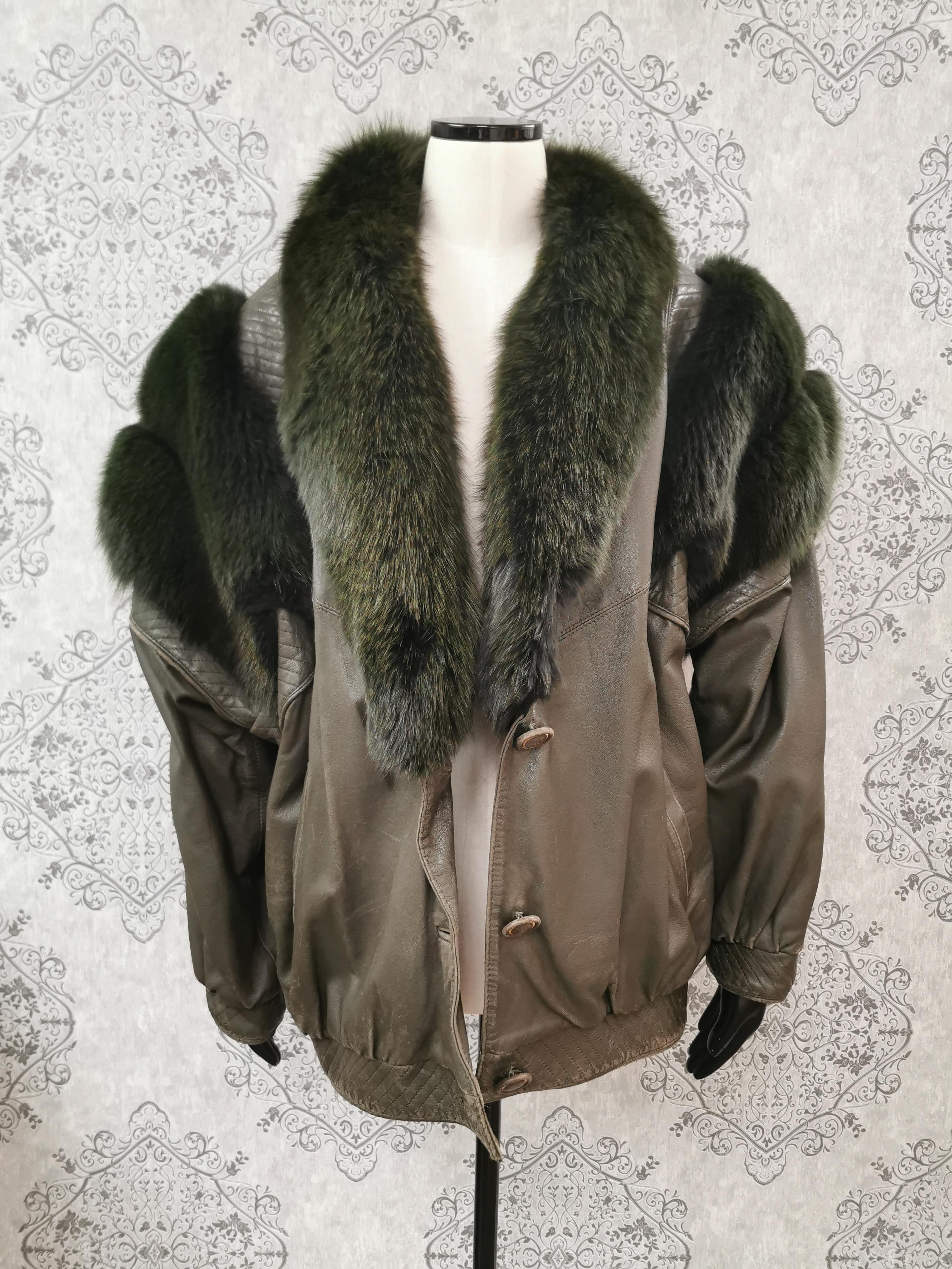 Saga fox leather coat with dyed shadow fox fur trim and sleeves size 12 For  Sale at 1stDibs
