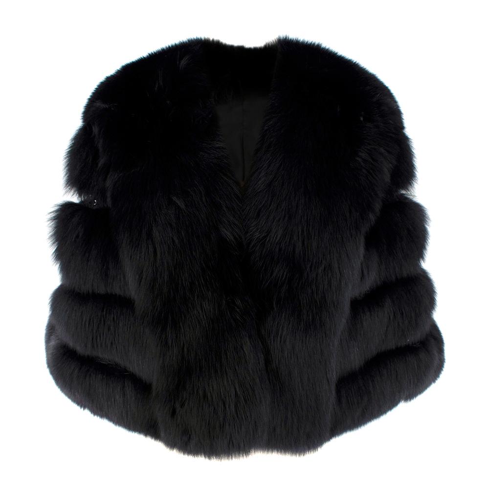 Saga Furs Fox Fur Shawl

- Hidden pockets
- Soft long haired fox fur
- Each row has a panel of embellished sequins 
- Thicker panel of fox fur around the neckline
- Extremely warm fur
- Fox fur from Finland
- Sustainably driven company with a focus