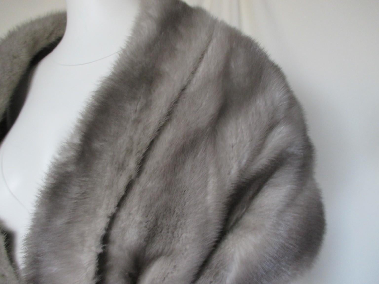 This beautiful stole is made of mink fur made by Saga furs Scandinavia, specially selected mink.

We offer more luxury fur products, view our frontstore.

Details:
Grey mink with lining
Furrier : Marcel Maky, Bruxelles
No closing hook, you can close