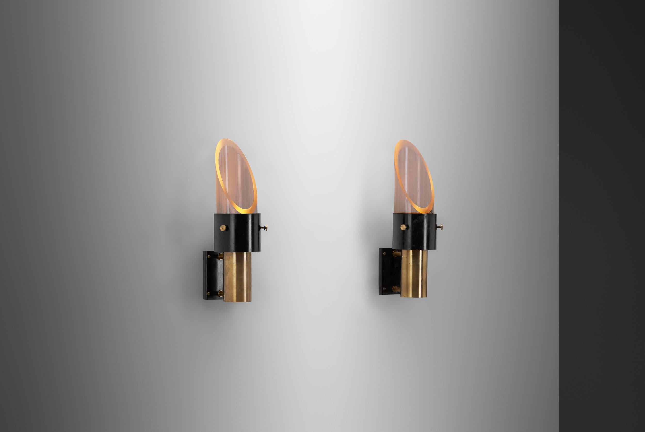 These Lyfa-edition “Saga” wall sconces by Danish architect and designer, Kay Kørbing are true collectors’ pieces. By the 1950s, Lyfa had built an international reputation for original, high-quality, modernist lamps. In the postwar era, the company