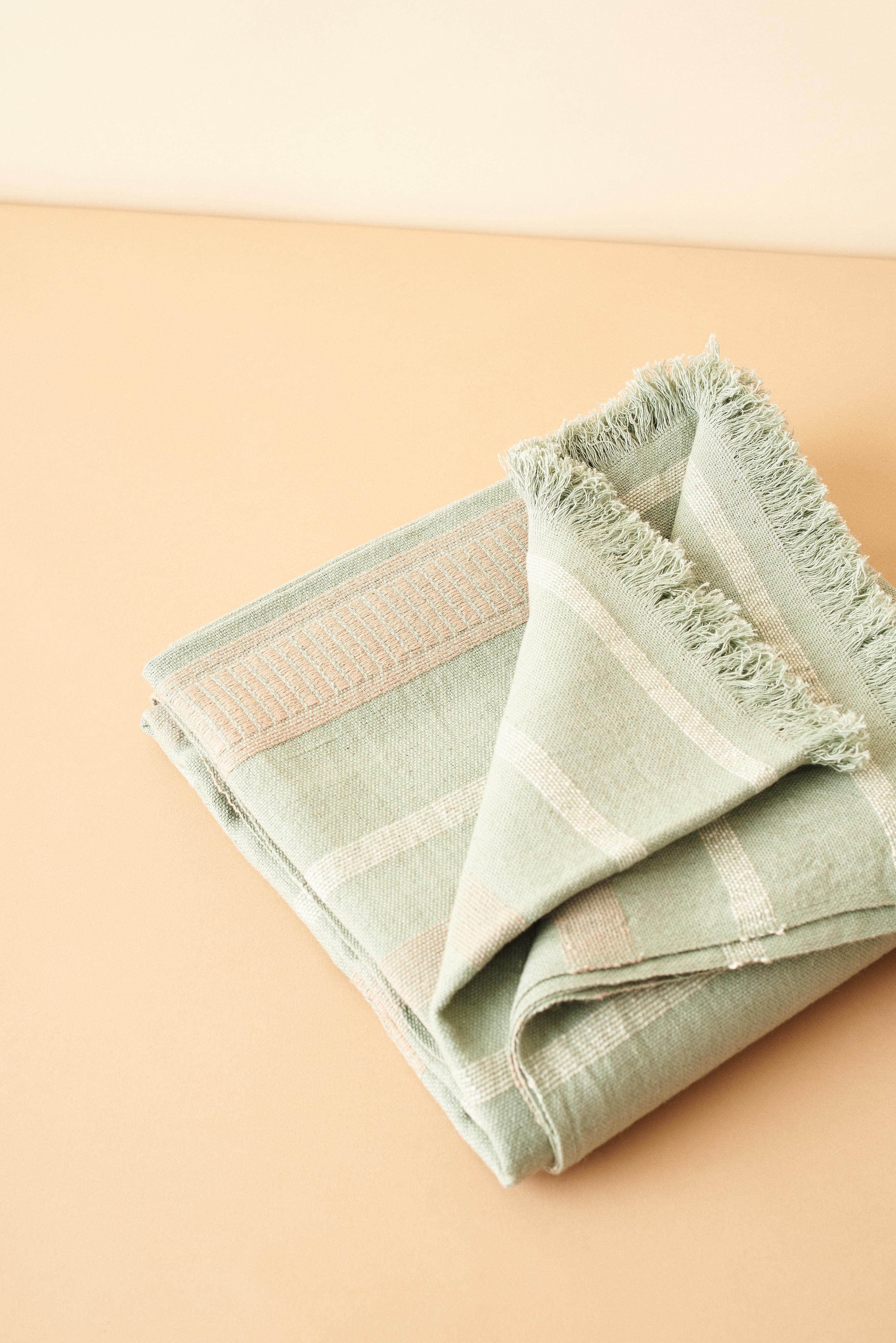 pastel green throw