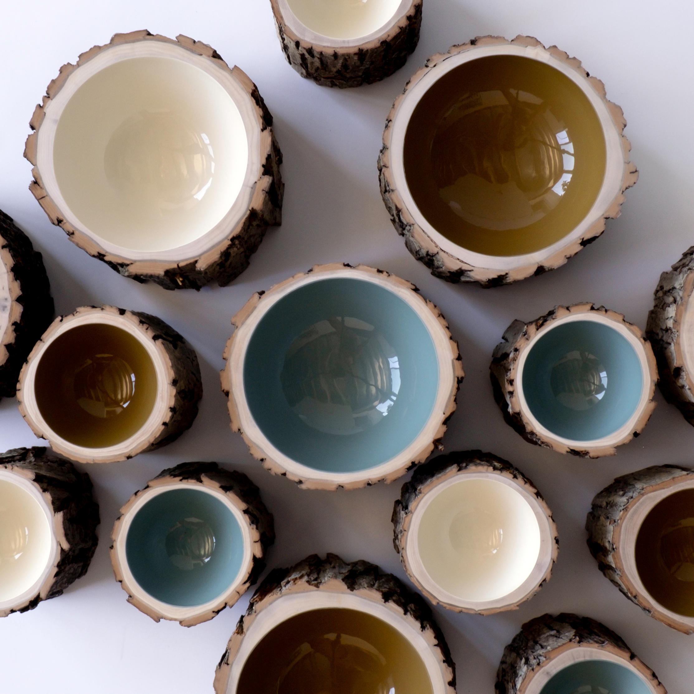 Log bowls combine the beauty of a tree in its natural state with a high-gloss, vibrant finish. Each bowl is handmade using locally reclaimed trees of all varieties (fallen or cut down due to infrastructure or inclement weather). The trees are hand