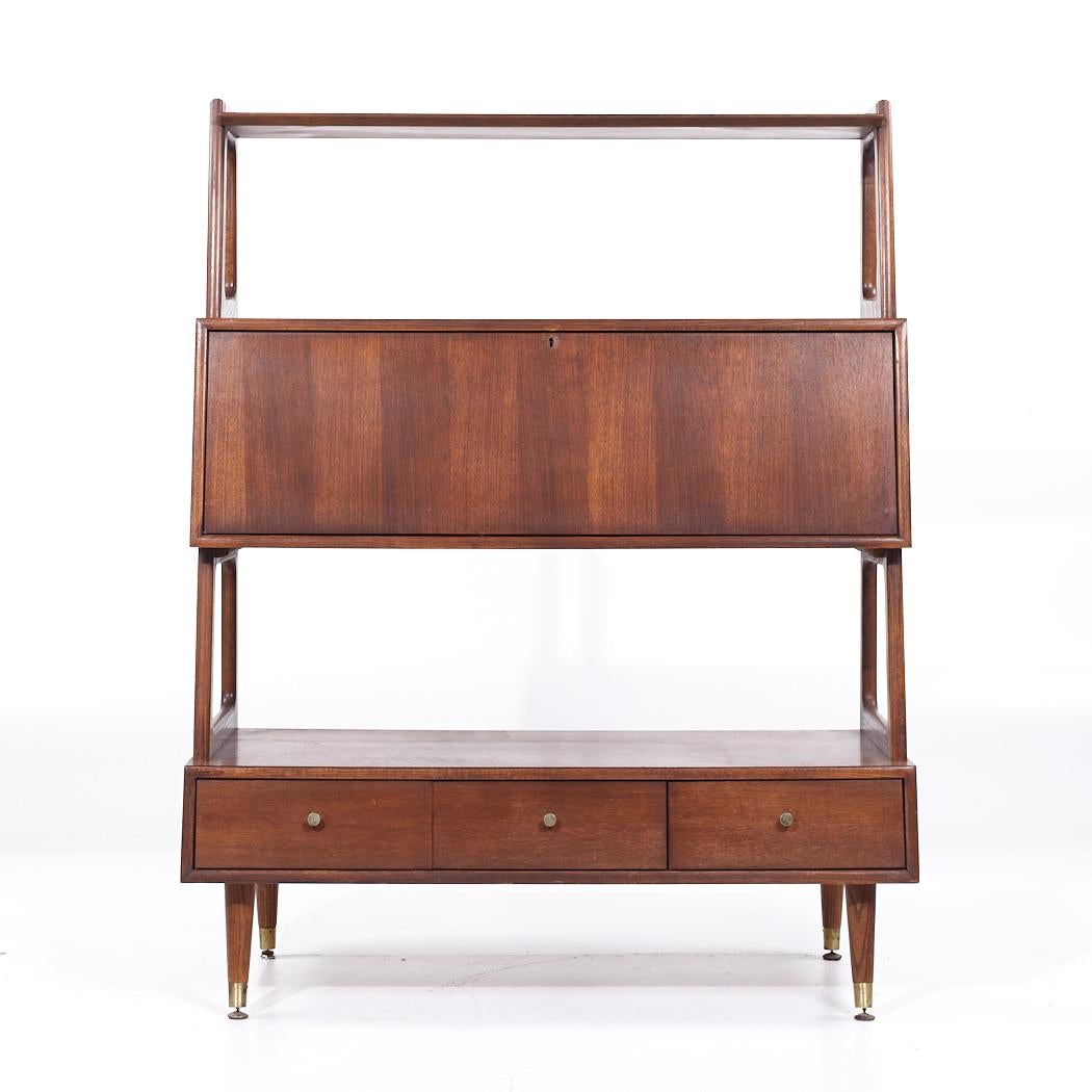 Saginaw Furniture Mid Century Walnut Bookcase Secretary Desk

This bookcase measures: 43 wide x 19 deep x 55 inches high

All pieces of furniture can be had in what we call restored vintage condition. That means the piece is restored upon purchase
