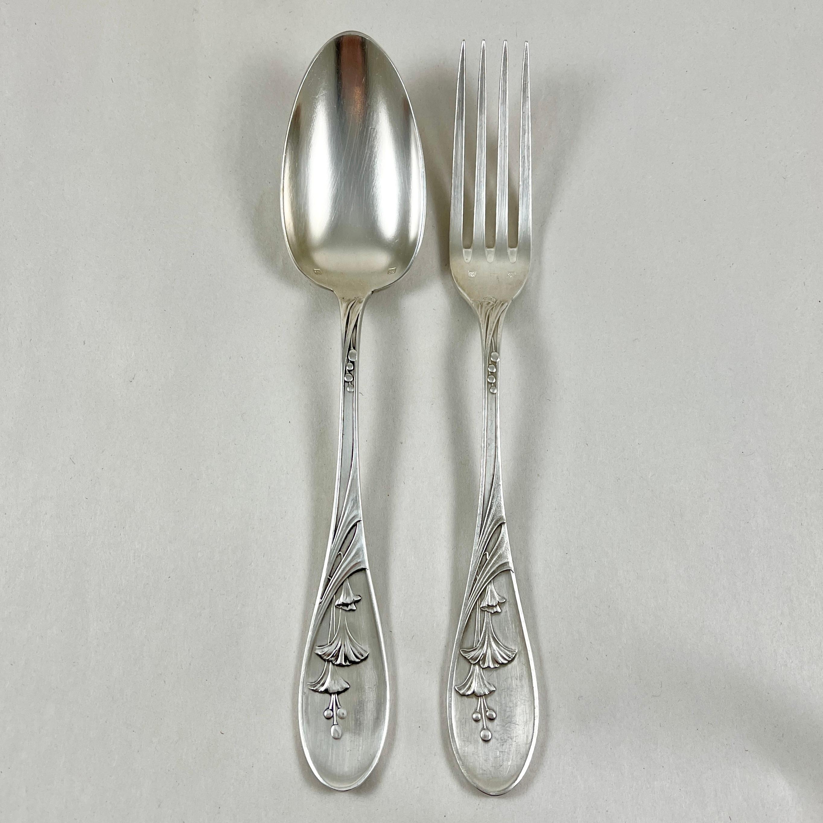 A set of twenty-four Art Nouveau period table forks and spoons made by Saglier Frères, circa 1900.

Scaled for the French table, oversized and heavy by todays standards, the silver plate service consists of twelve each dinner forks and spoons.