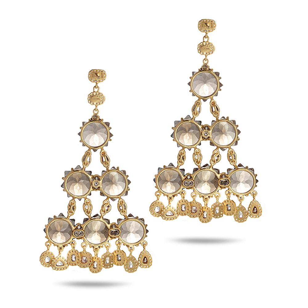 Sagrada Kaleidoscope Earrings Set in 20 karat Yellow Gold with 52.73 Carat Smokey Quartz and 7.26 Carat Diamonds. The Sagrada Collection is inspired by the doors of the Passion Facade, one of the three grand facades of the Sagrada Familia in
