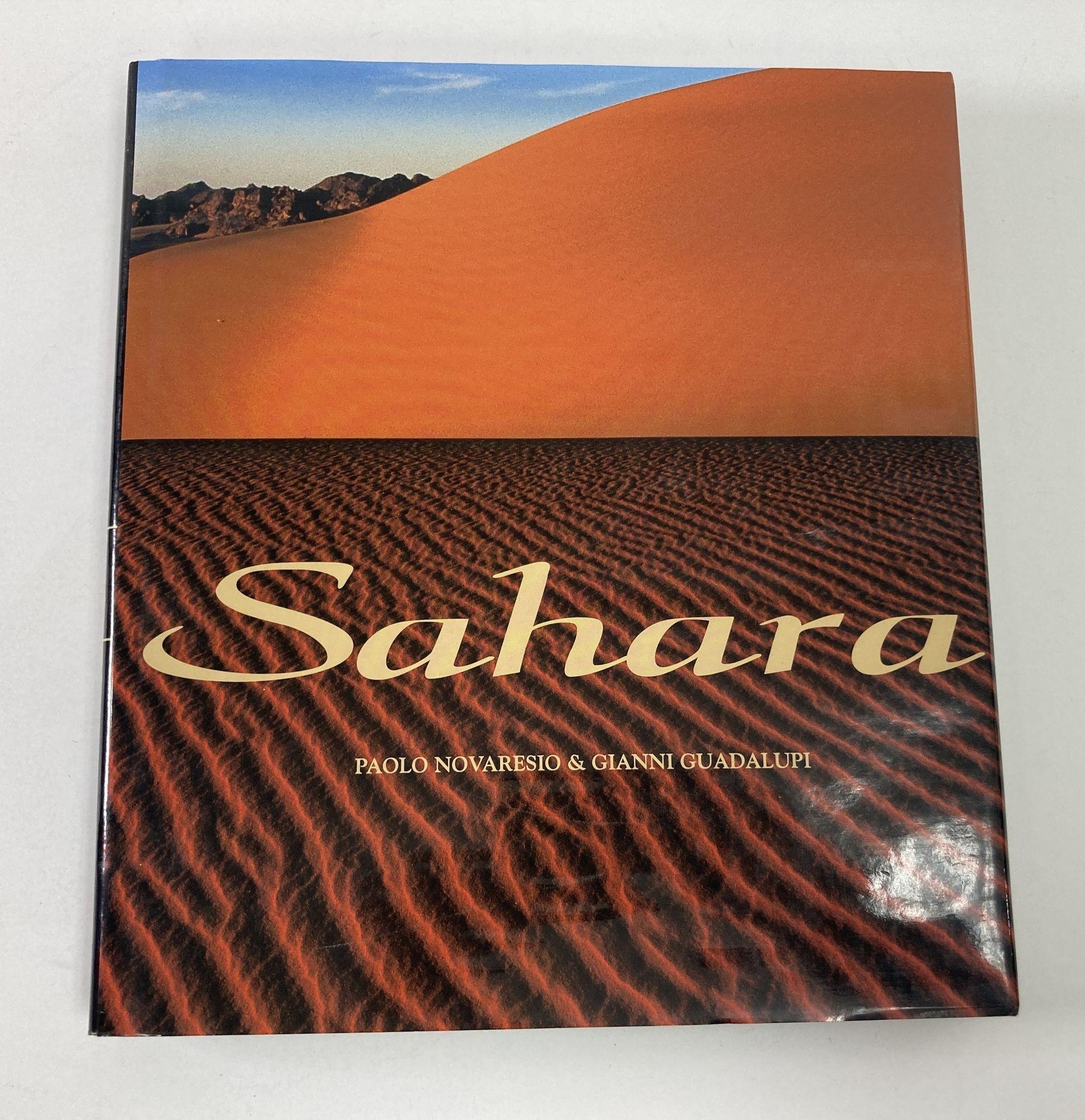 Sahara : an Immense Ocean of Sand by Paolo Novaresio, Gianni Guadalupi Hardcover Book.
The Sahara Desert is not just a wasteland of sand and sun, but a teeming wilderness. Sahara: An Immense Ocean of Sand tells the story of the world's largest