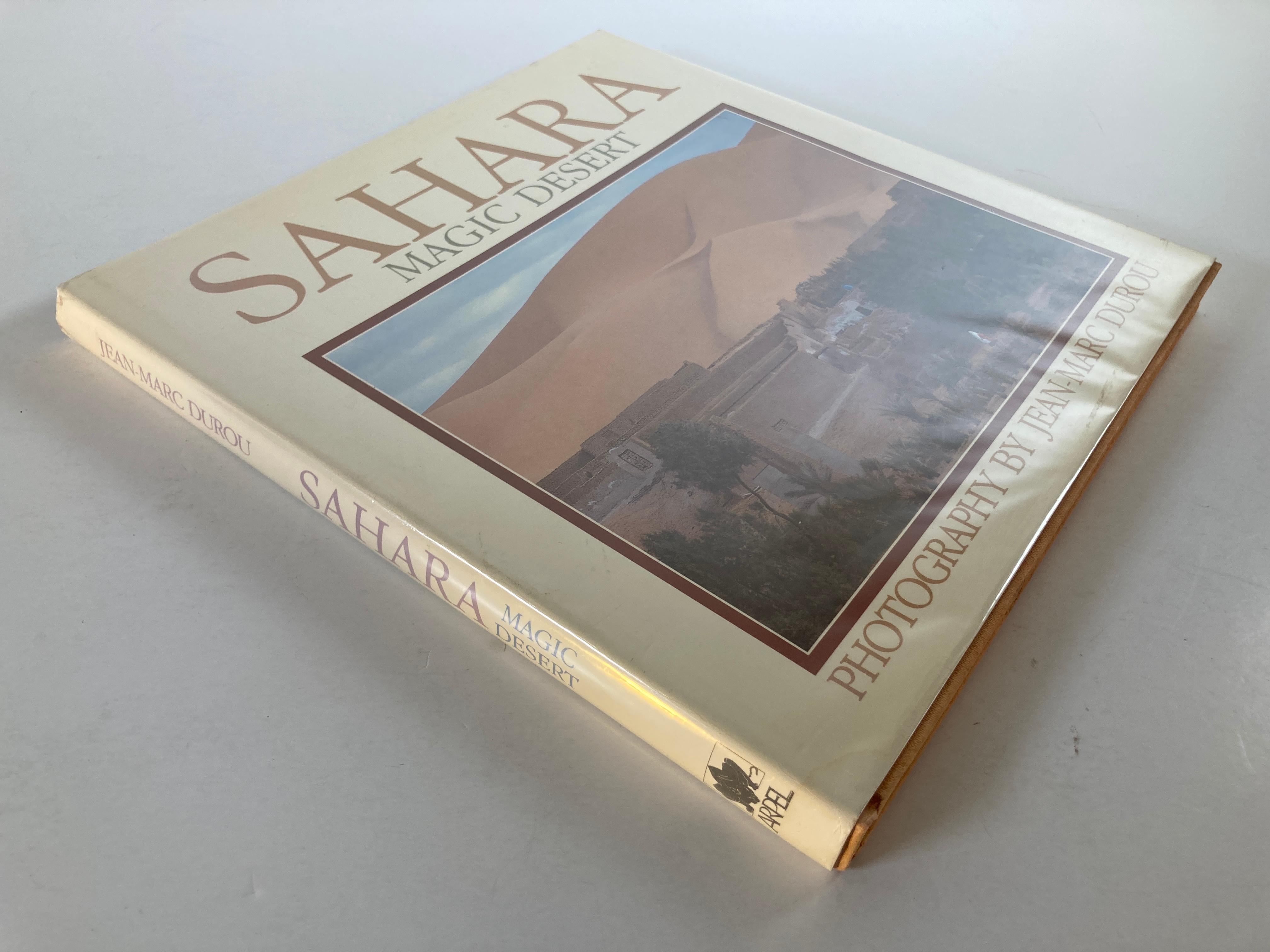SAHARA Magic Desert hardcover book
Photographs show the Sahara's mountains, sand dunes, canyons, oases, towns, and the daily life of its nomadic people, the Tuaregs.
Jean-Marc Durou, Théodore Monod
153 pp. First U.S. Edition. 
Title: SAHARA: