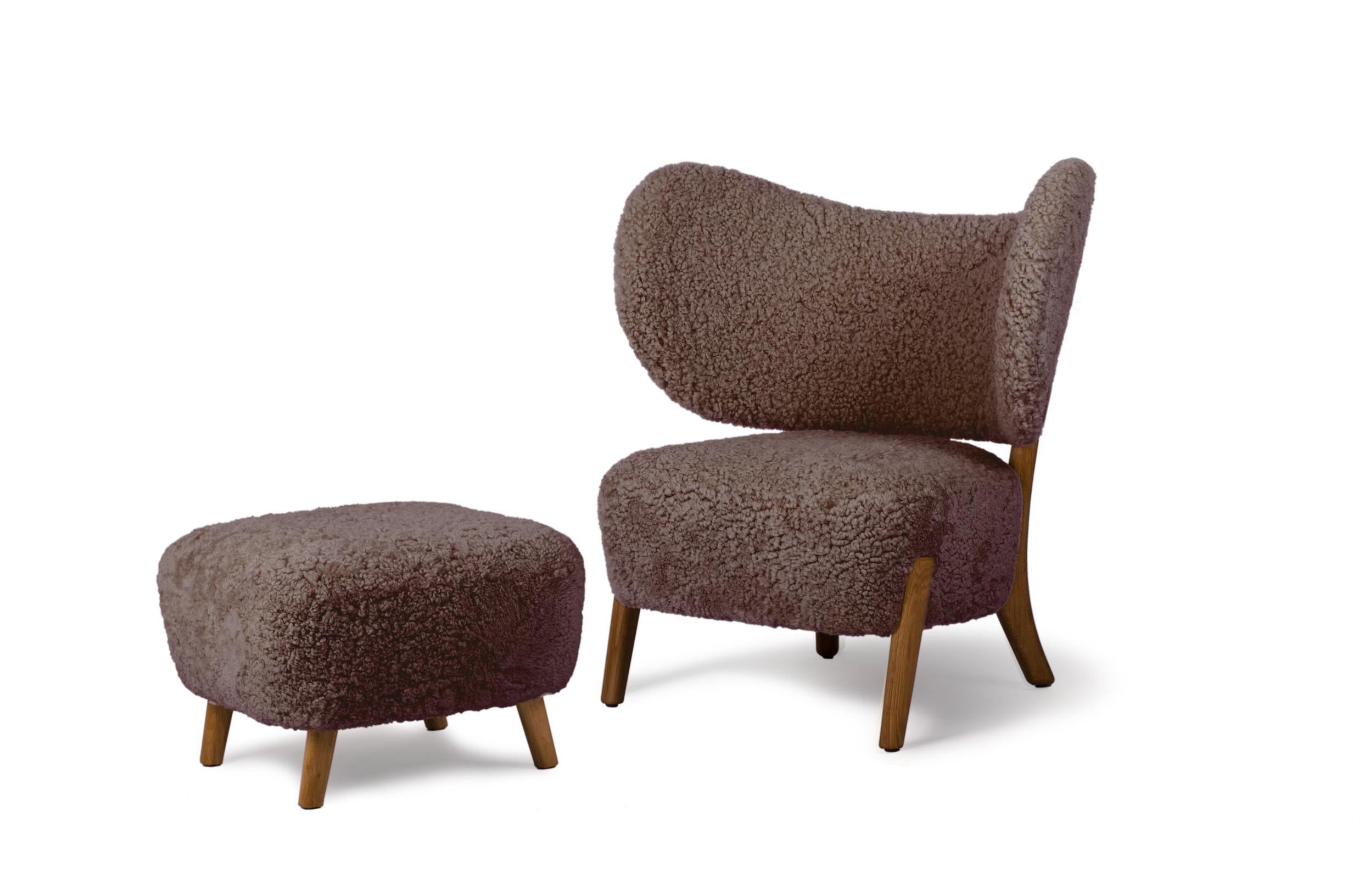Moonlight Sheepskin Set Of TMBO Lounge Chair & Pouff by Mazo Design
Dimensions: W 90 x D 68.5 x H 87 cm / W 49 x D 49 x H 34 cm
Materials: Oak, Sheepskin
Also Available: ROMO/Linara, DAW/Royal, KVADRAT/Remix, KVADRAT/Hallingdal & Fiord,