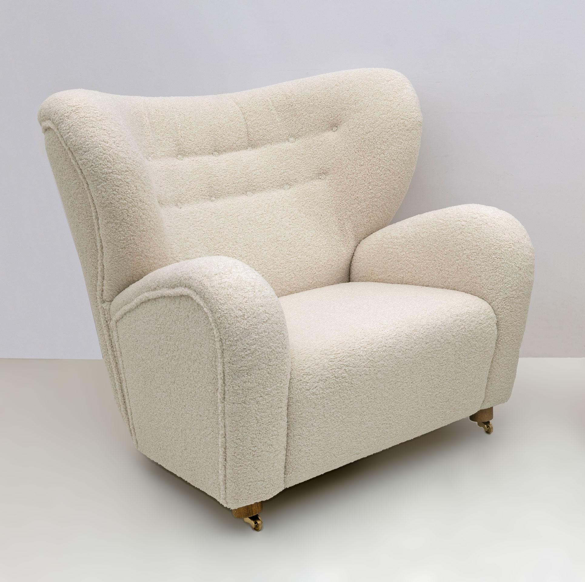 Sahco Zero The Tired Man beige lounge chair by Lassen. Flemming Lassen designed The Stanco upholstered armchair in 1935 for the Copenhagen cabinetmakers' guild competition. It features organic bear shapes and caused a sensation then as now with its