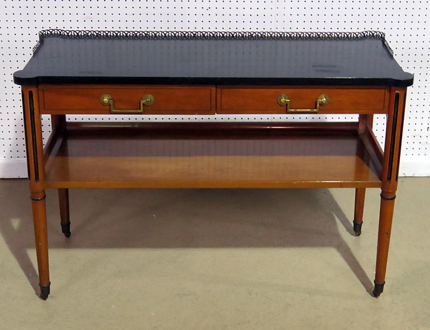 Directoire style server by Nahon with two drawers, ebonized top, brass hardware and on casters.