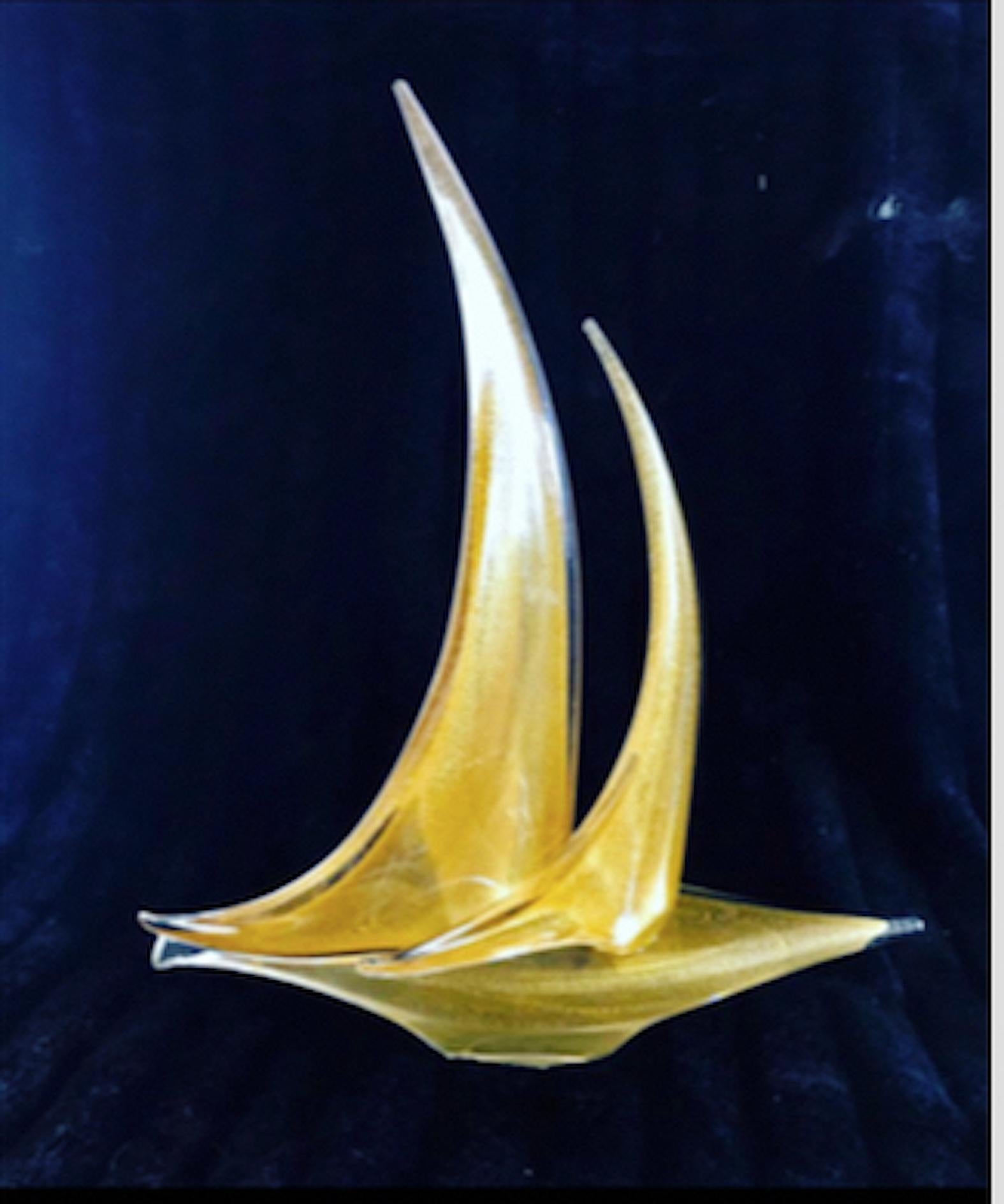 Exceptional Seguso sailing boat with incrustation gold glass Murano. The Design and the quality of the glass make this piece the best of the italian Design.
This unique Seguso sailing boat in gold glass murano are exceptional.

discount shipping