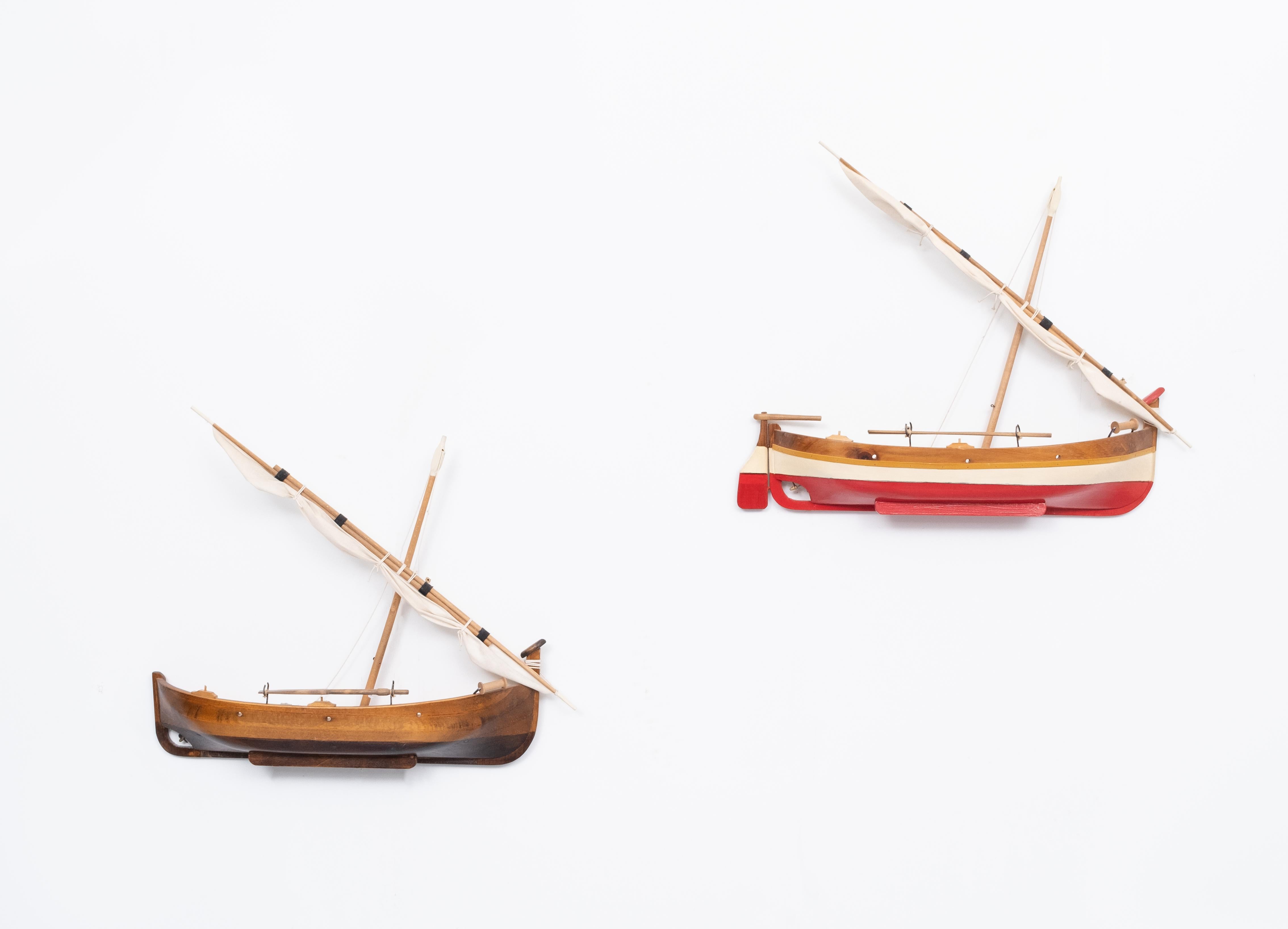 Two unique wooden sailing boats, Handmade in the 60s. Small socket bulb When lid gives a 
warm romantic atmosphere. Lots off small details on the boats. Charming and unique set.