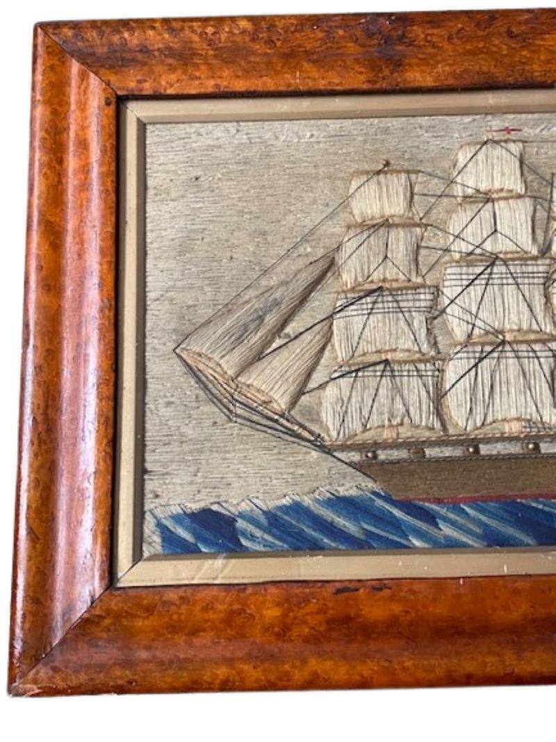 Antique Sailor's Folk Art Woolie of a Single Decker Ship of the Line, circa 1850, a sailor's folk art woolwork picture handcrafted of woolen yarn in a bold variety of stitches, depicting a single gun deck ship of the line under full sail, with gold