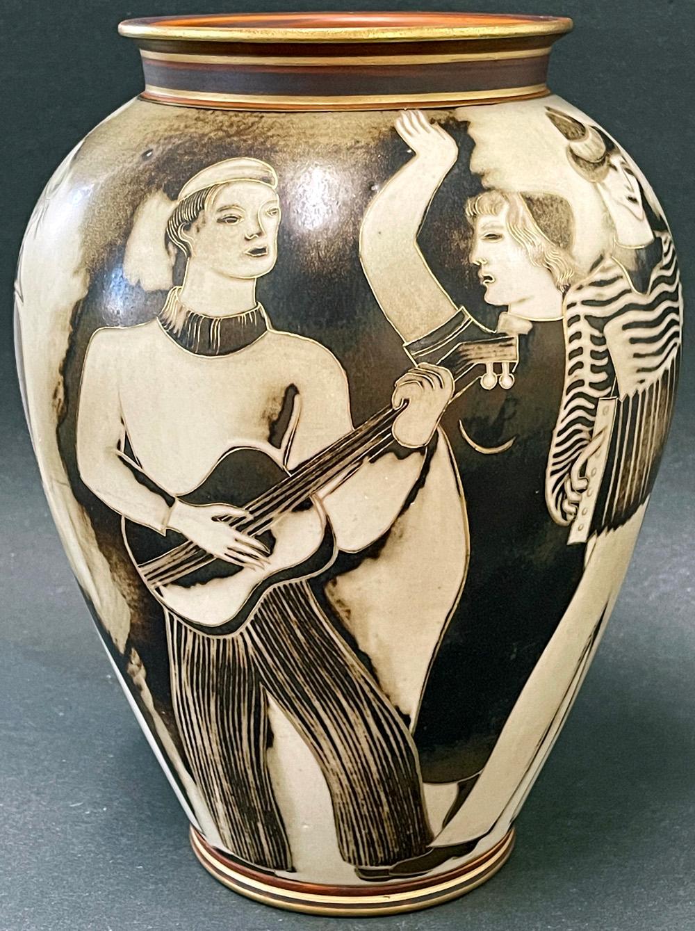 Perhaps the finest and most ambitious Flambé porcelain by Gunnar Nylund we have ever offered, this remarkable vase depicts a frieze-like array of sailors on the waterfront, all playing instruments and accompanied by young women clothed in the latest