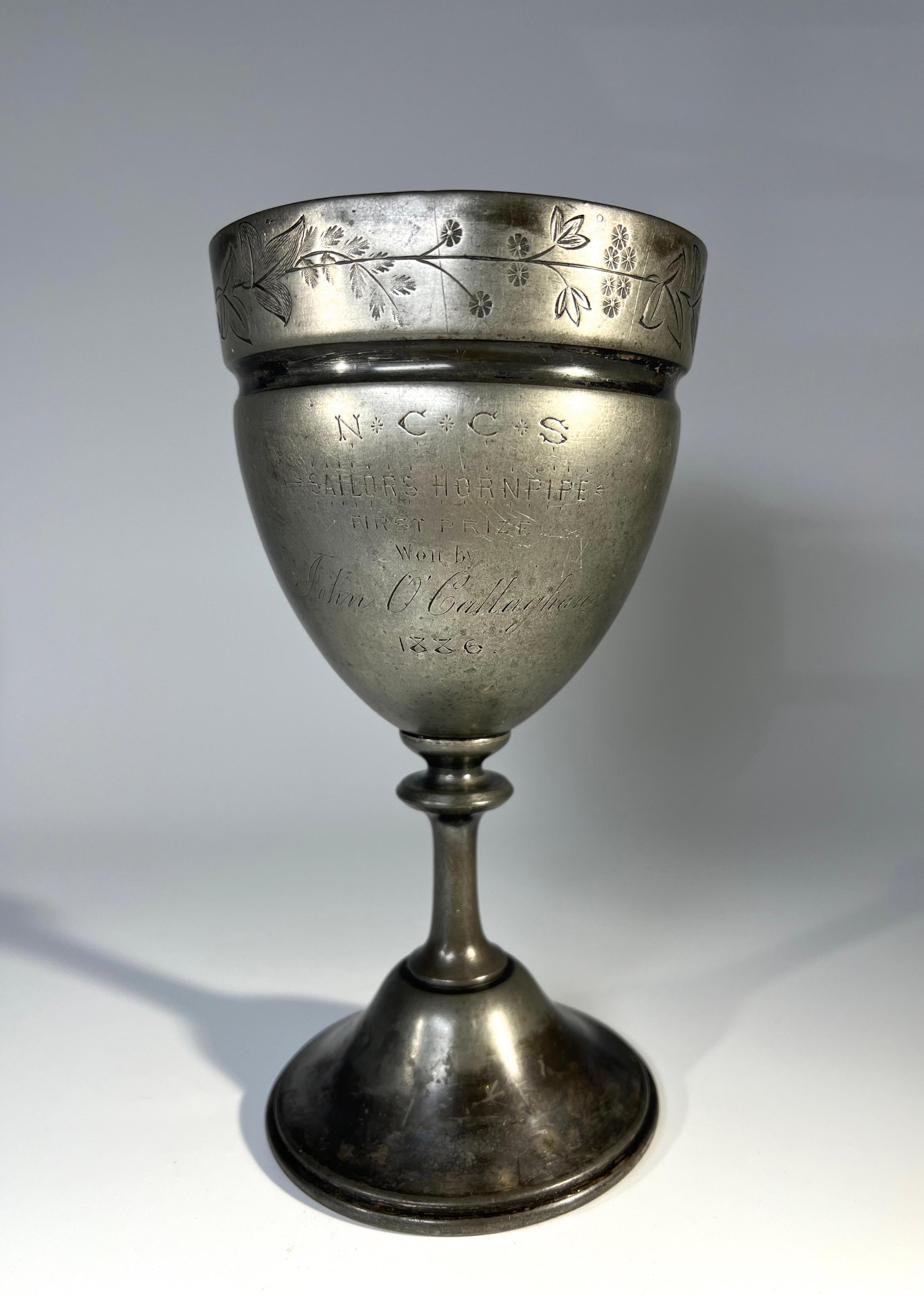 Antique chalice trophy inscribed, NCCS Sailors Hornpipe, First Prize Won By John O'Callaghan. 1886
A terrific conversation piece
Likely to be silver plate, Meriden Britannia Company specialised in silver plate ware
Circa 1886
Signed Meriden B