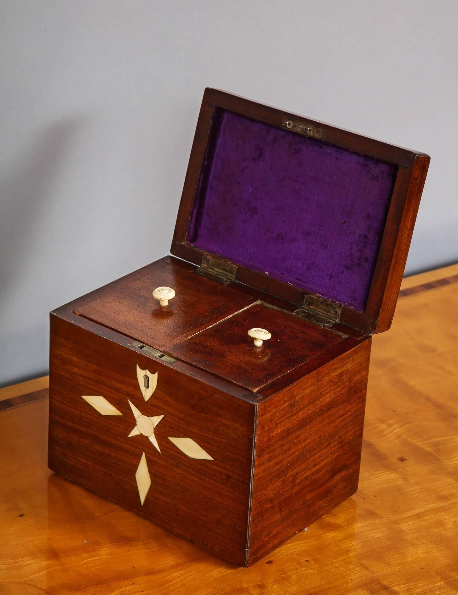 Fine 19th century mahogany and bone inlaid box having diamond inlaid top, the front with shield, compass and ray inlay, the interior with two compartments each with wooden lids and bone handles, the whole with good pleasing color. Possibly sailor
