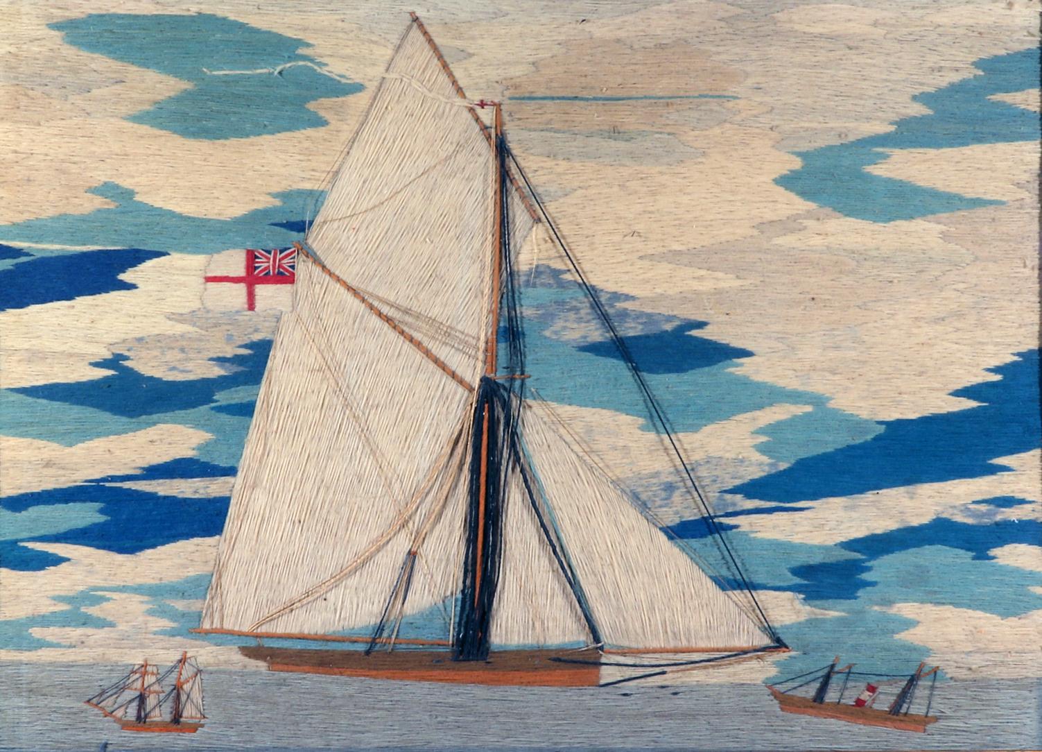 Sailor's Woolwork Woolie of Gaff-rigged Sloop,
Circa 1870

The British sailor's woolwork or woolie depicts a starboard side view of a gaff-rigged sloop under full sail against a cloudy sky with streaks of different blues amongst the white clouds. In