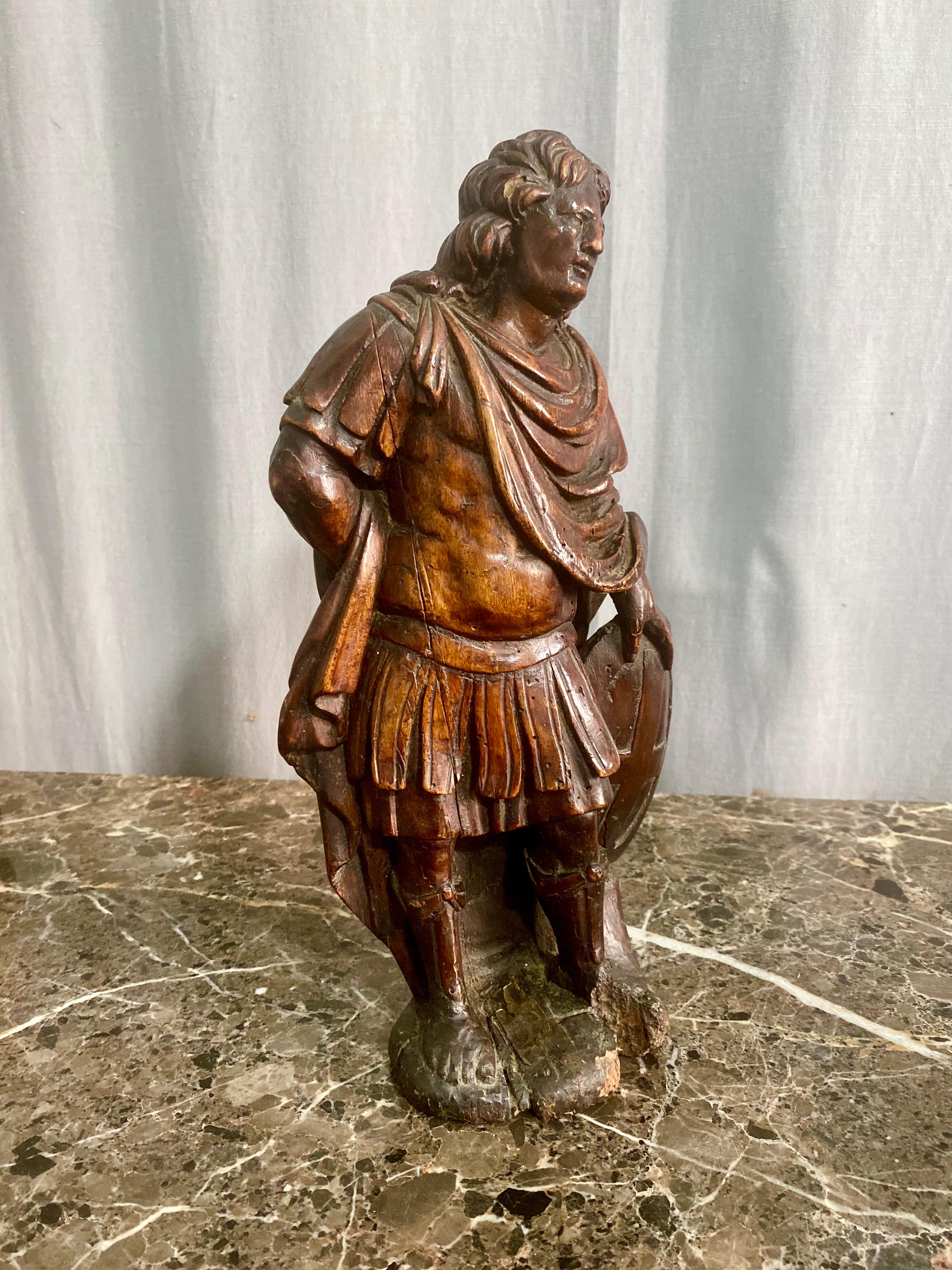 Fino al XVIII secolo Sant'Adrian - Scultura in legno intagliato di scuola francese del XVII secolo in vendita