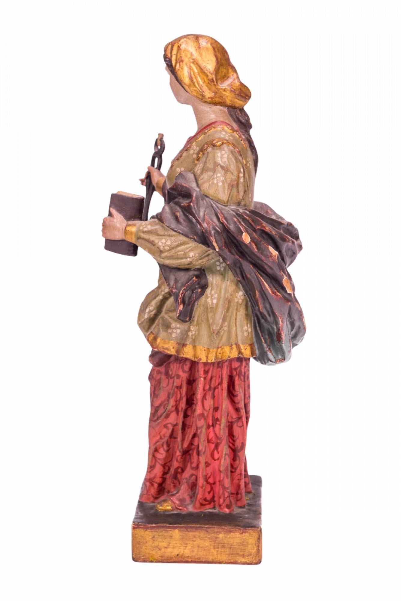 Frühe spanische geschnitzte und polychromierte Skulptur der Heiligen Apollonia von Alexandria, Schutzpatronin der Zahnmedizin, aus dem 18. Diese Skulptur, die in dem Buch Santa Apolonia En España abgebildet ist, gehörte Dr. Gonzalez Rex, der als