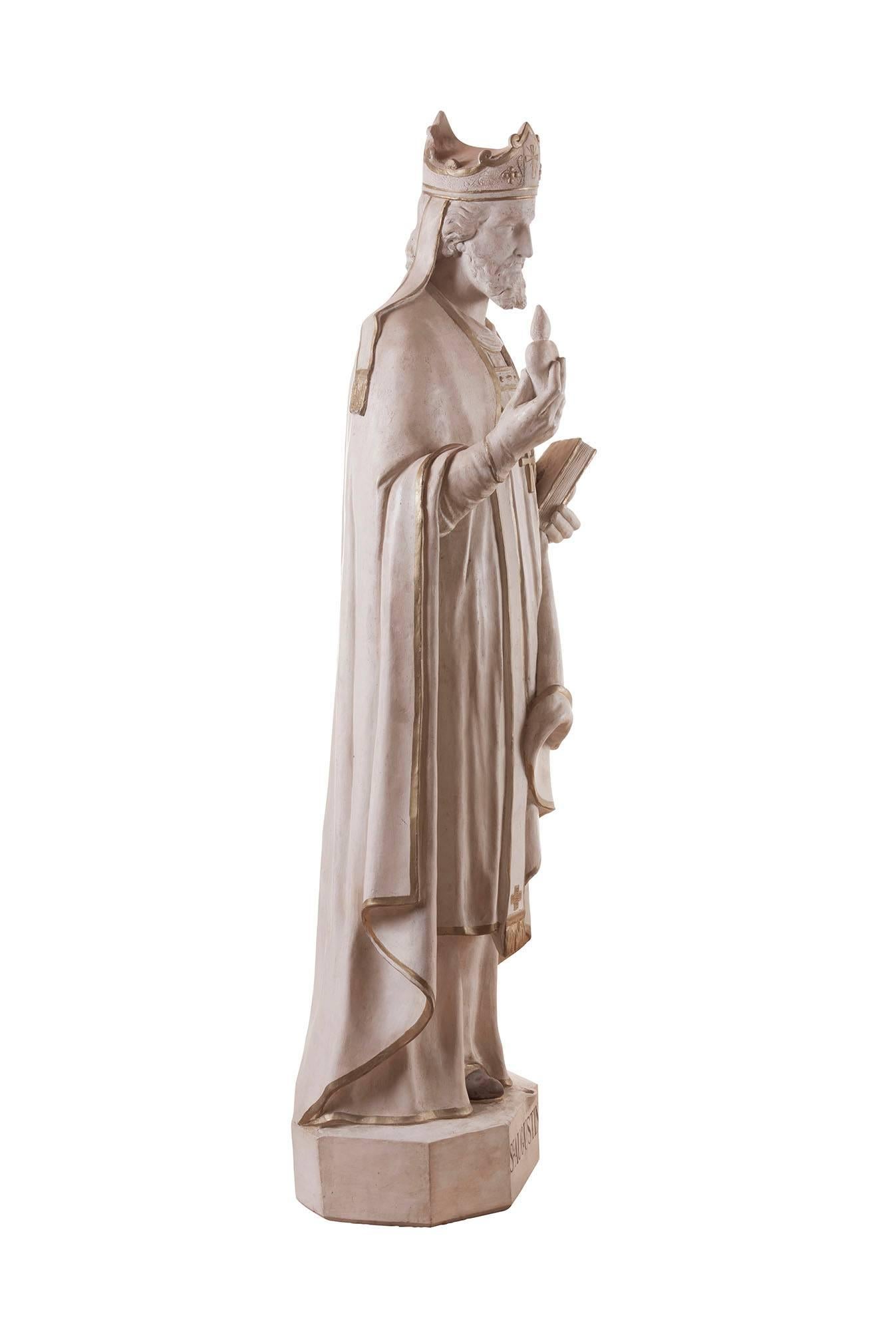 A very nice statue showing Saint Augustine
In the original color
The typical attribute in his hand is the heart.
A wonderful statue.