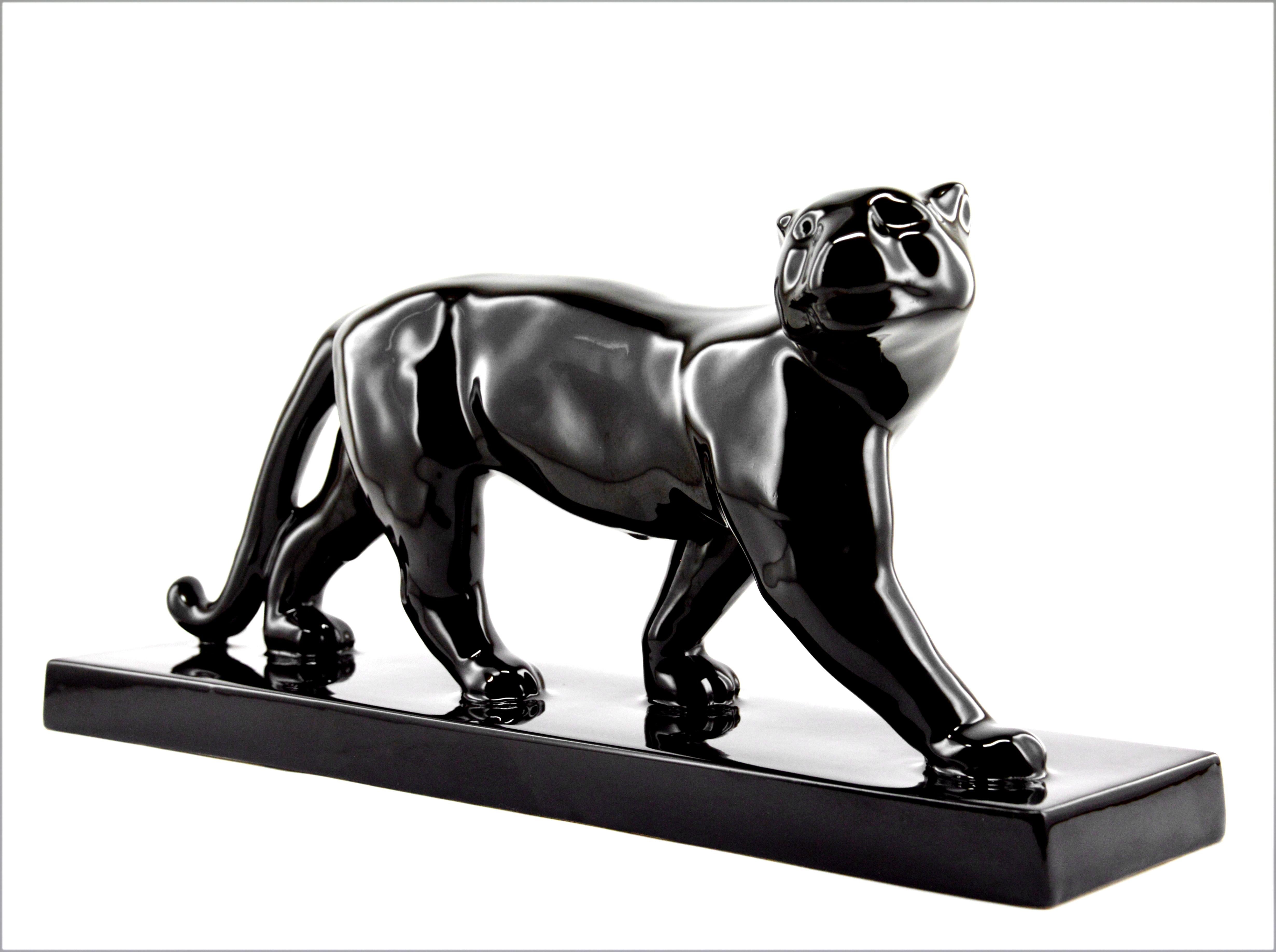 French Art Deco ceramic black panther, France, 1930s. Measures: Width 47cm - 18.5 in., height 22cm - 8.7 in., depth 12cm - 4.7 in. Close to the Charles Lemanceau's work. Same period as Charles Lemanceau, François Pompon, Lejean, Jean & Jacques