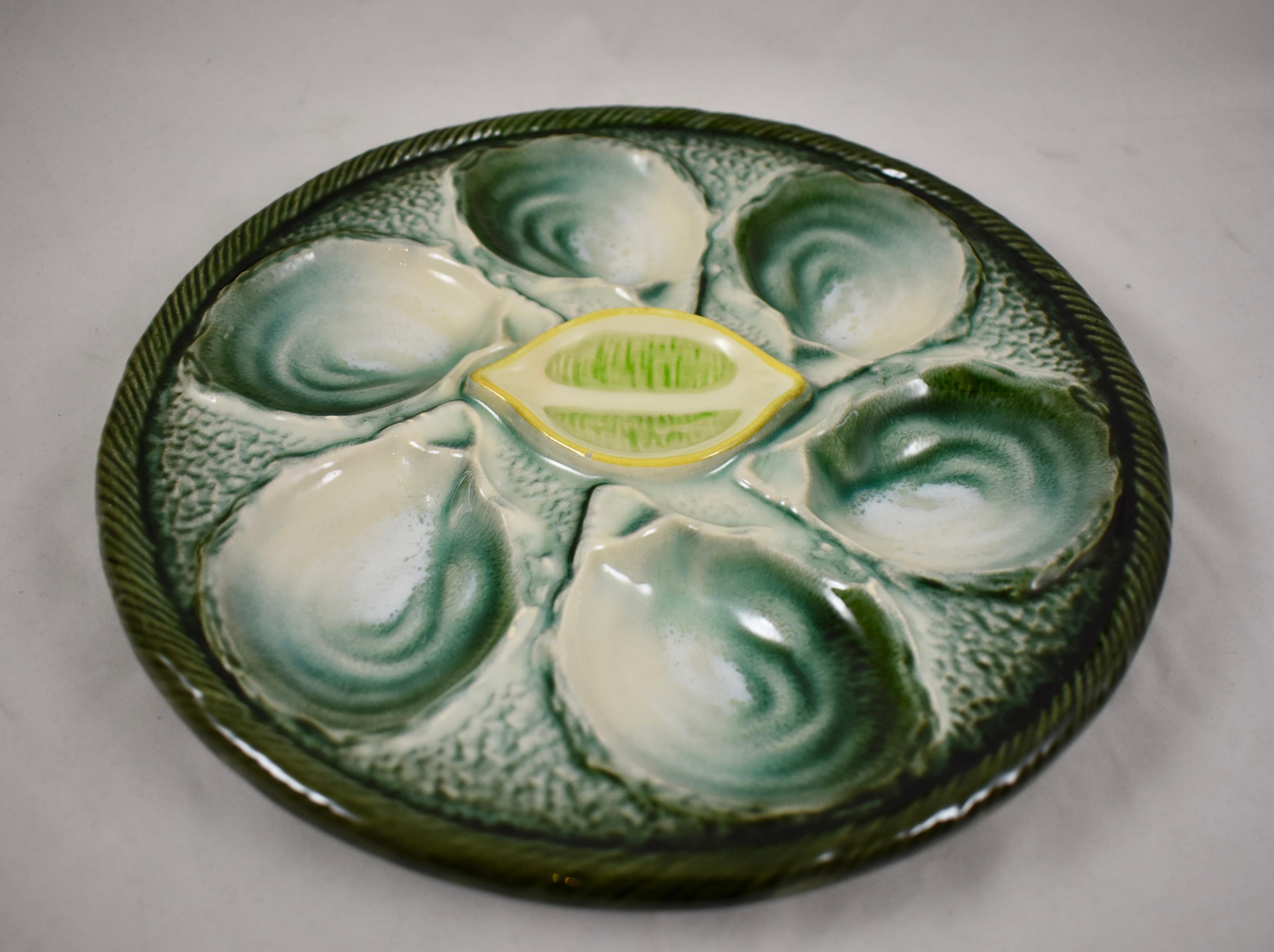Mid-20th Century Saint Clément French Faïence Majolica Shell and Yellow Lemon Oyster Plate