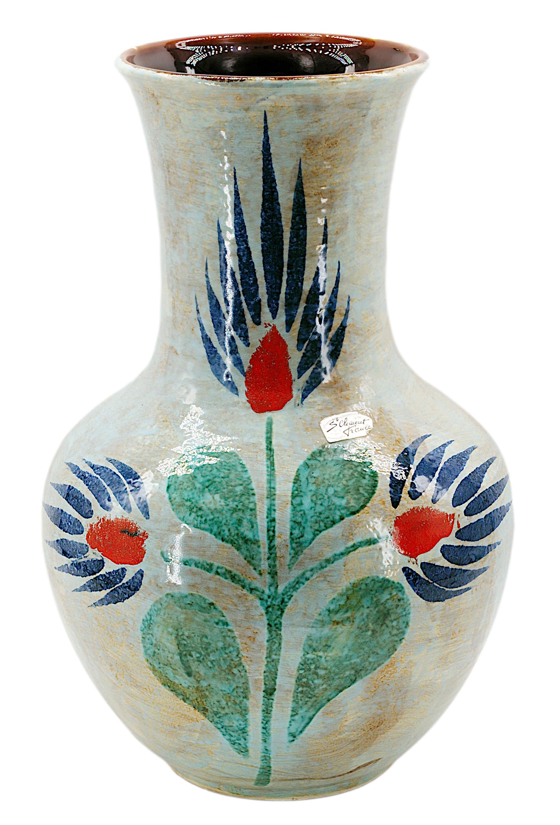 Large Saint-Clément Stoneware Vase, France, 1950s. This impressive and rare stoneware vase from Saint-Clément, France dates to the 1950s and is distinguished by its exceptional size and striking design. Featuring a hand-painted stylized floral