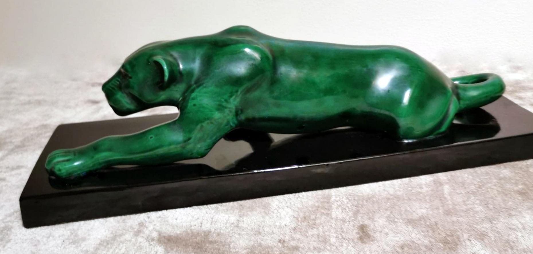 We kindly suggest you read the whole description, because with it we try to give you detailed technical and historical information to guarantee the authenticity of our objects.
Spectacular and large green ceramic panther glazed in Art Deco style,