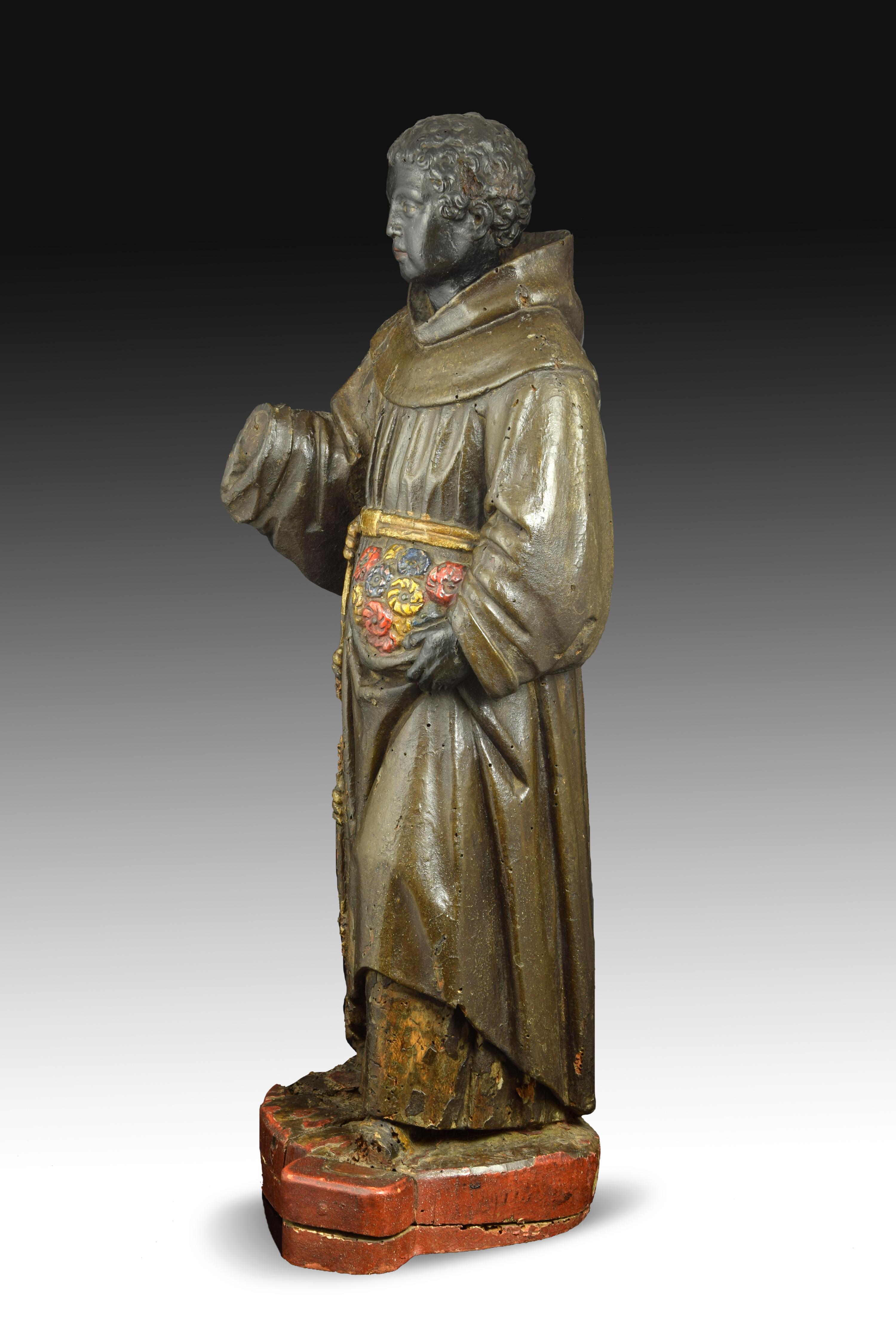 On a pedestal stands the figure of a young man dressed in the Franciscan habit. He wears his clothes in front of him with his left hand, revealing a handful of flowers, while raising his right. Saint Didacus of Alcalá de Henares (known in spanish as