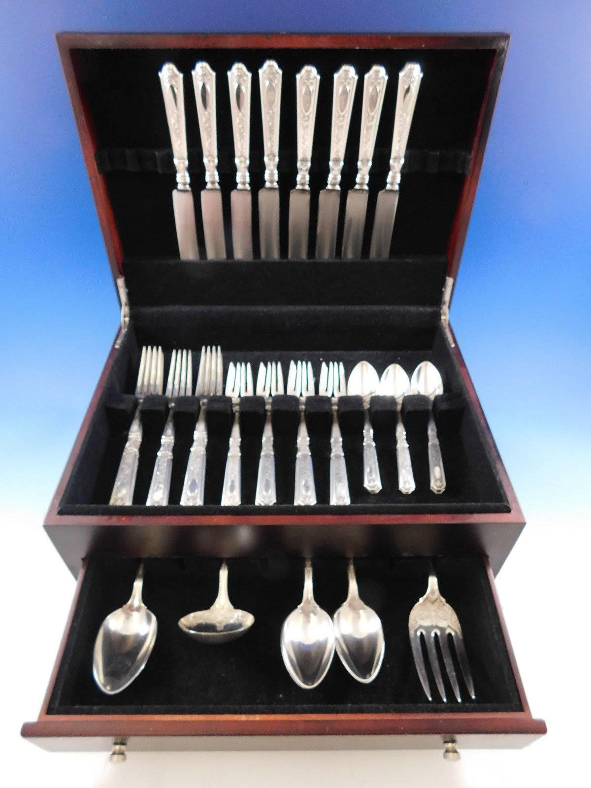 Exquisite dinner size saint Dunstan chased by Gorham sterling silver flatware set, 43 pieces. This set includes: 

eight dinner knives, 9 3/4