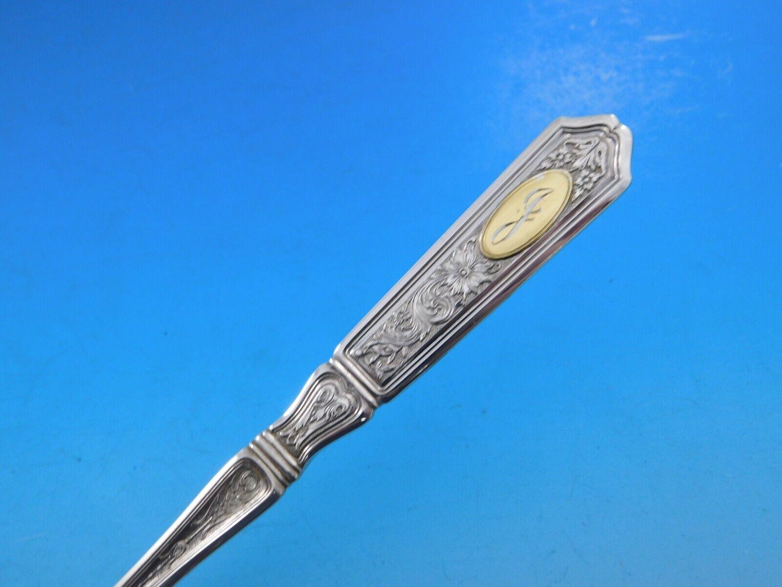 Dinner Size Saint Dunstan Chased with gold accent by Gorham sterling silver Flatware set, 32 pieces. This set includes:

8 Dinner Size Knives, 9 5/8