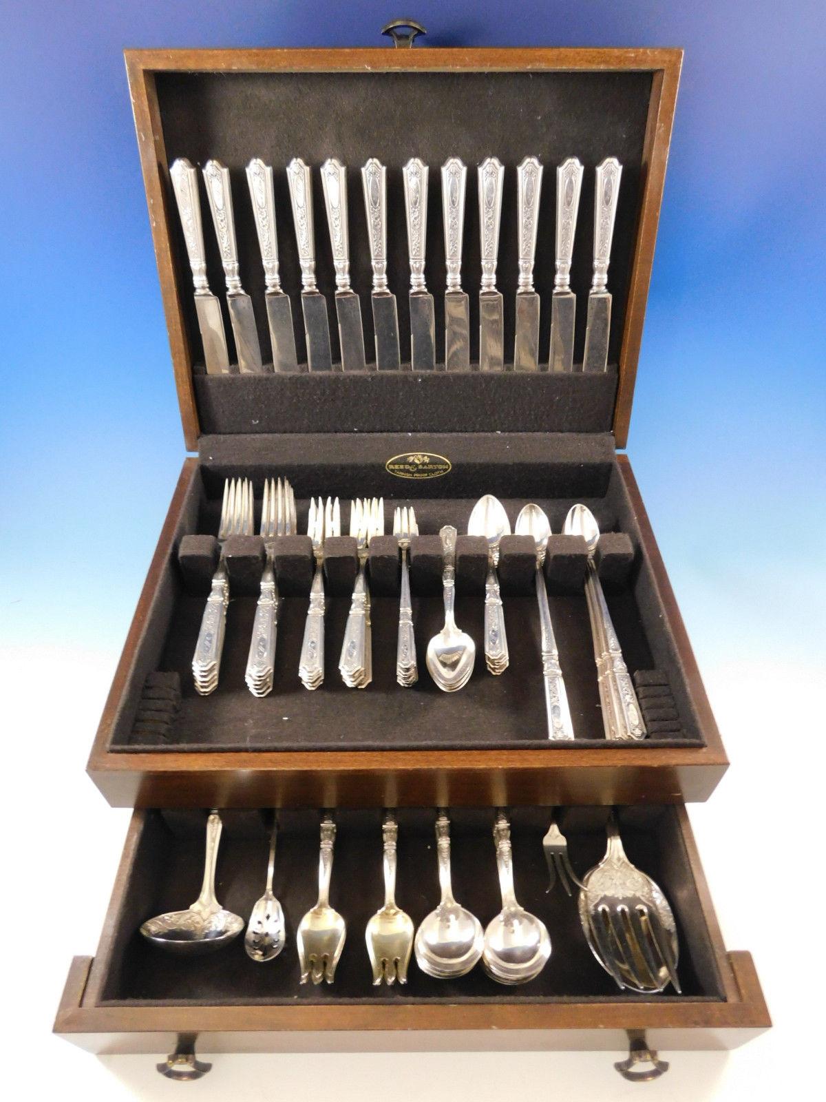 Large Saint Dunstan Chased by Gorham sterling silver flatware set of 96 pieces. This set includes:

12 knives, 8 3/8