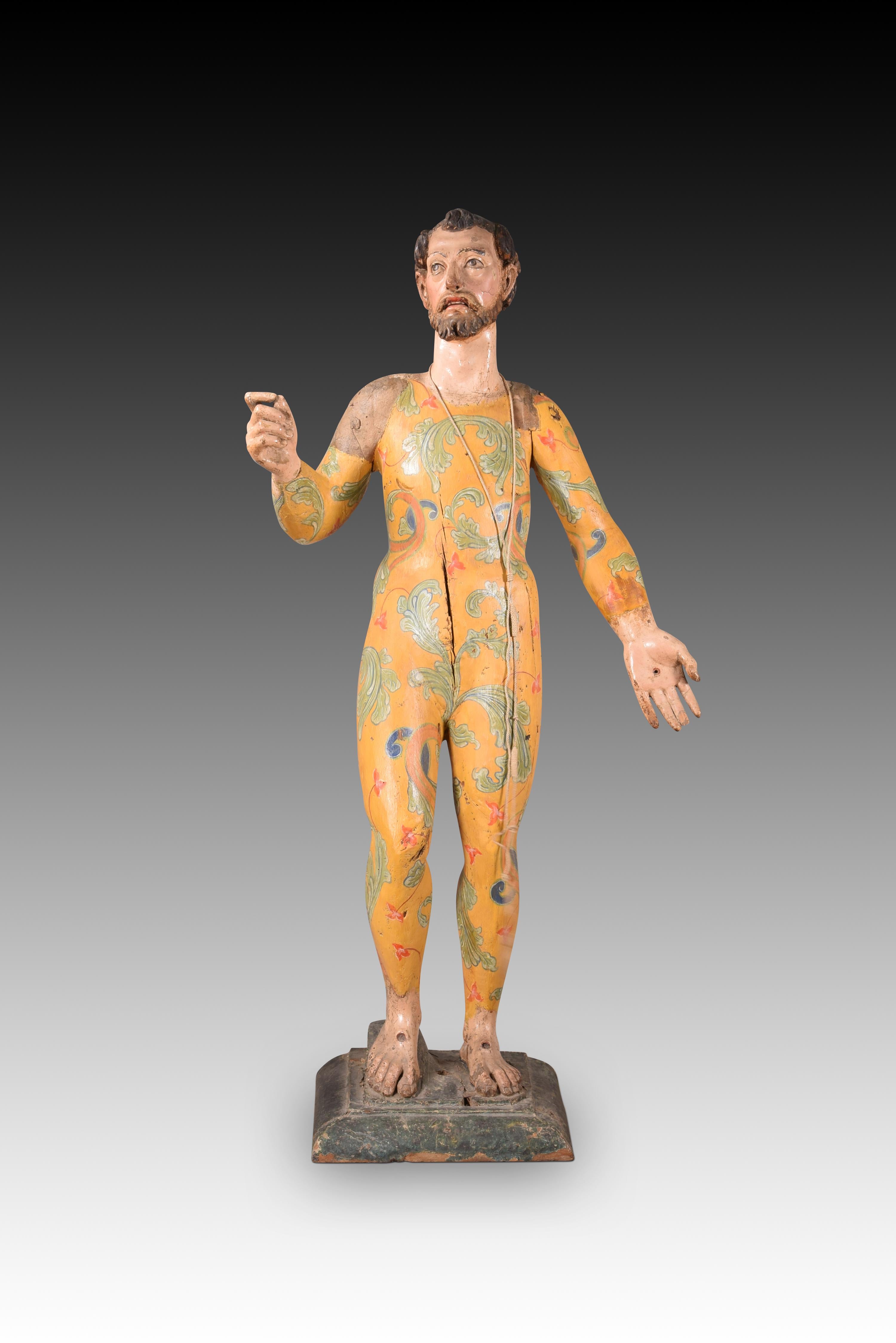 San Francisco to dress. Carved and polychrome wood. Spanish school, 17th century. 
Has damage. 
Polychrome wood carving that shows, standing on a simple pedestal, a young male figure, with short, wavy hair and a beard and moustache, with his right
