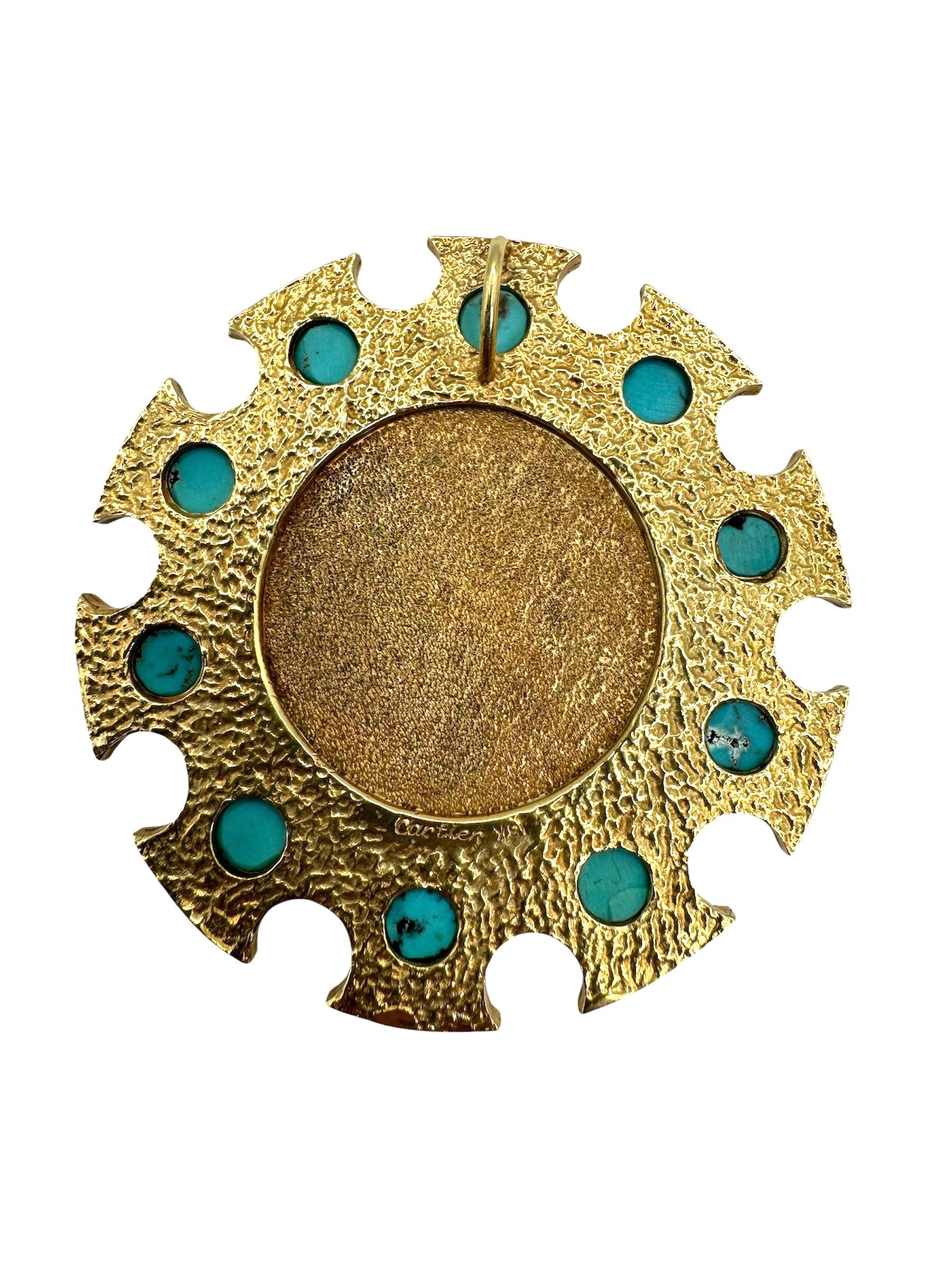 A magnificent 18k yellow gold Cartier pendant, showcasing a featuring Saint George on horseback slaying a dragon, encircled by 10 vibrant turquoise stones