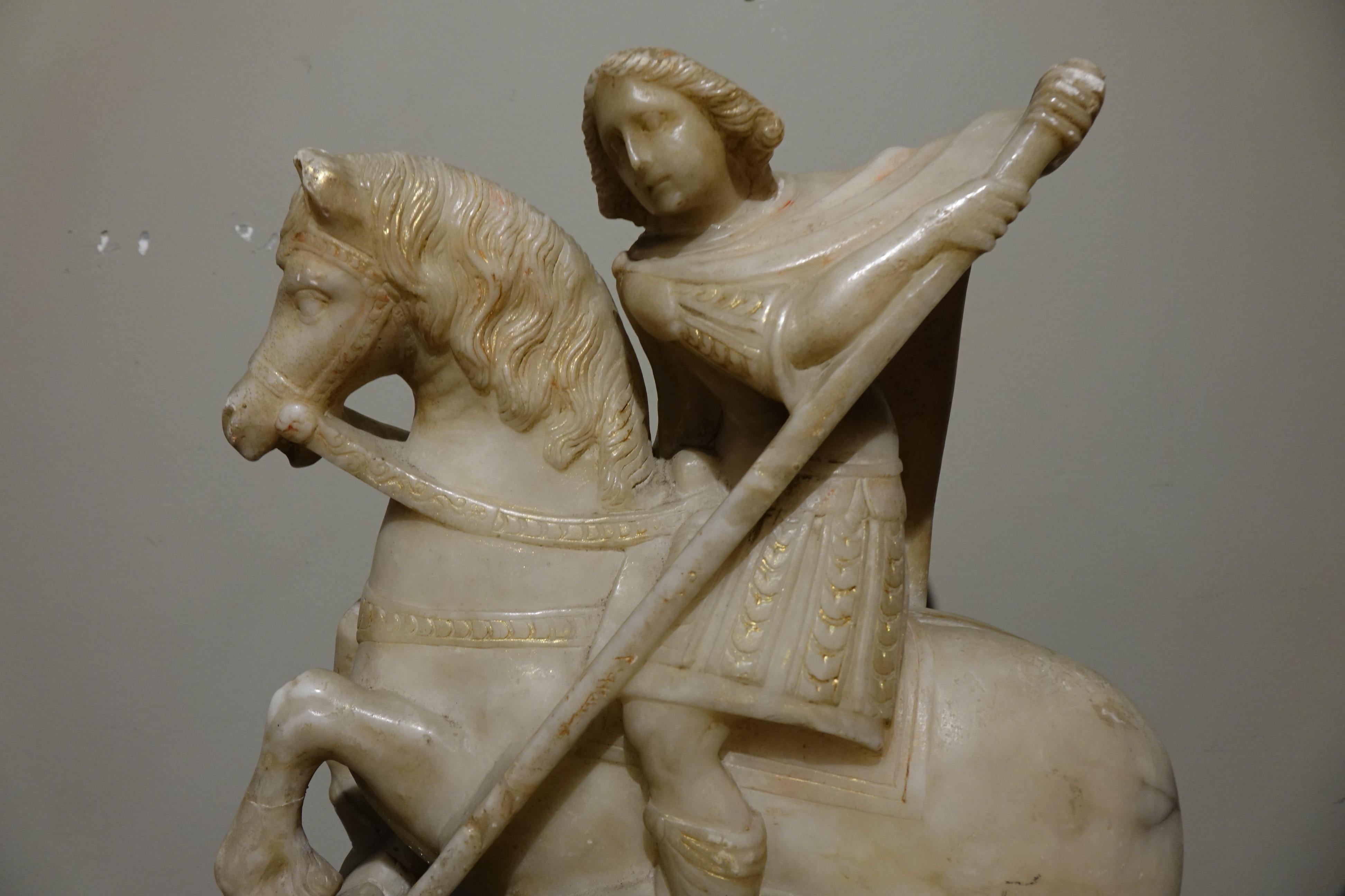 Carved alabaster group, with base, representing Saint George slaying the dragon.
Flanders, 17th c.
Missing horse's tail, chips on the base and gluing (with original parts).
Traces of polychromy and gold repairs.
Beautiful, very expressive ensemble.
