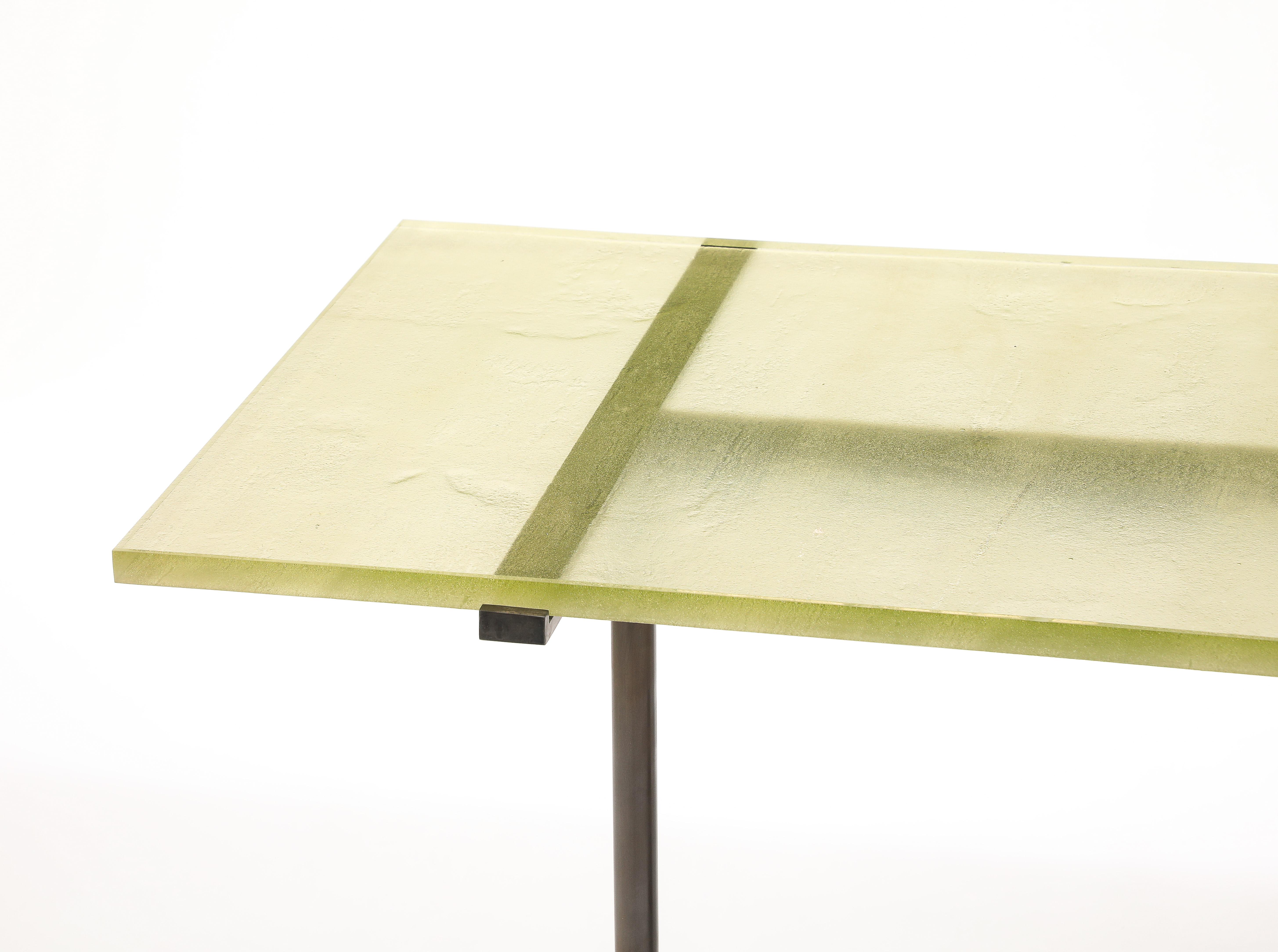 Stunning Console table in cut and patinated steel with a thick absinth green Saint Gobain top.