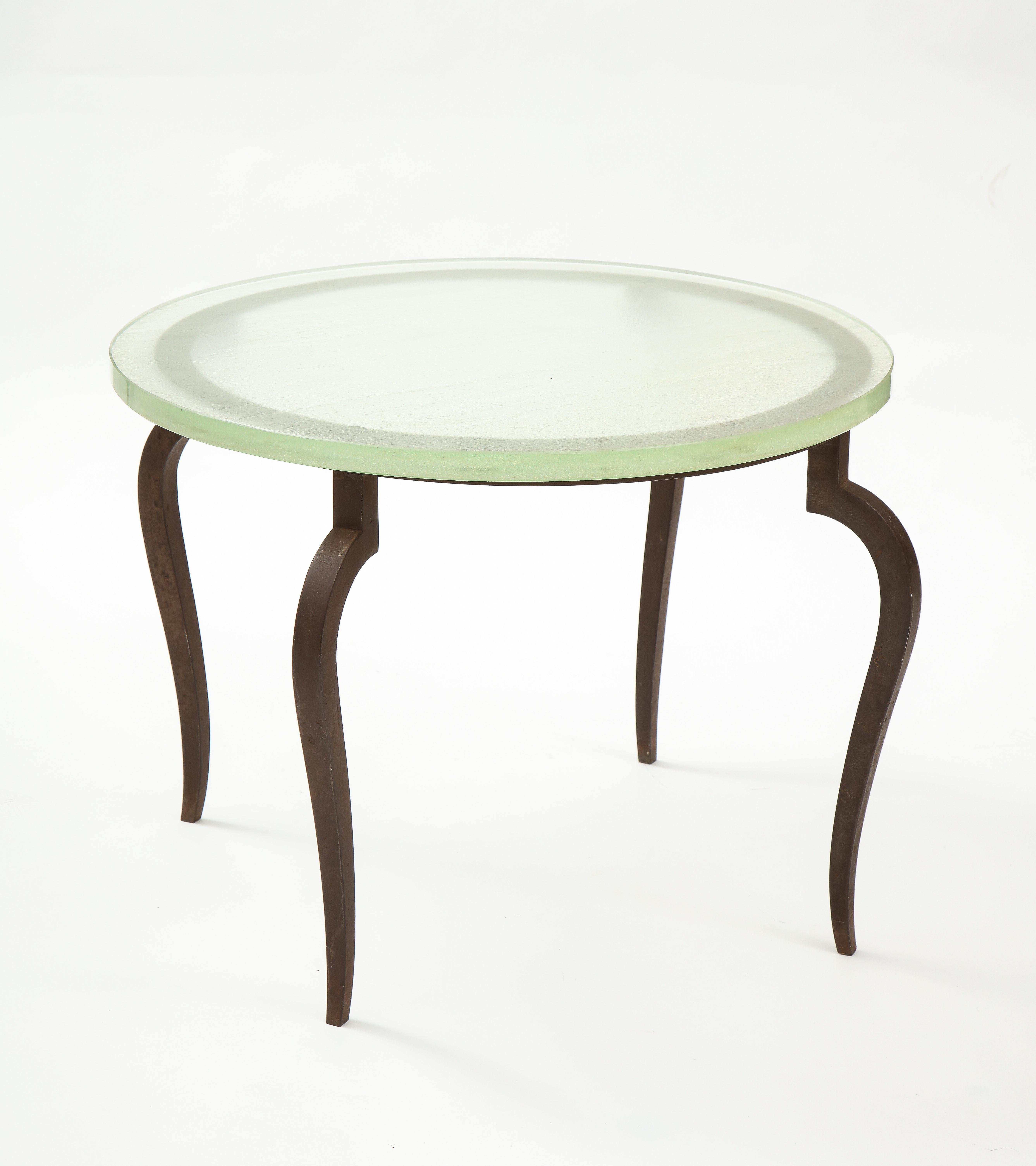 French Saint Gobain thick glass top coffee table with bronze legs, France, c. 1930
Measures: Height 15.75, diameter 23.5 in.