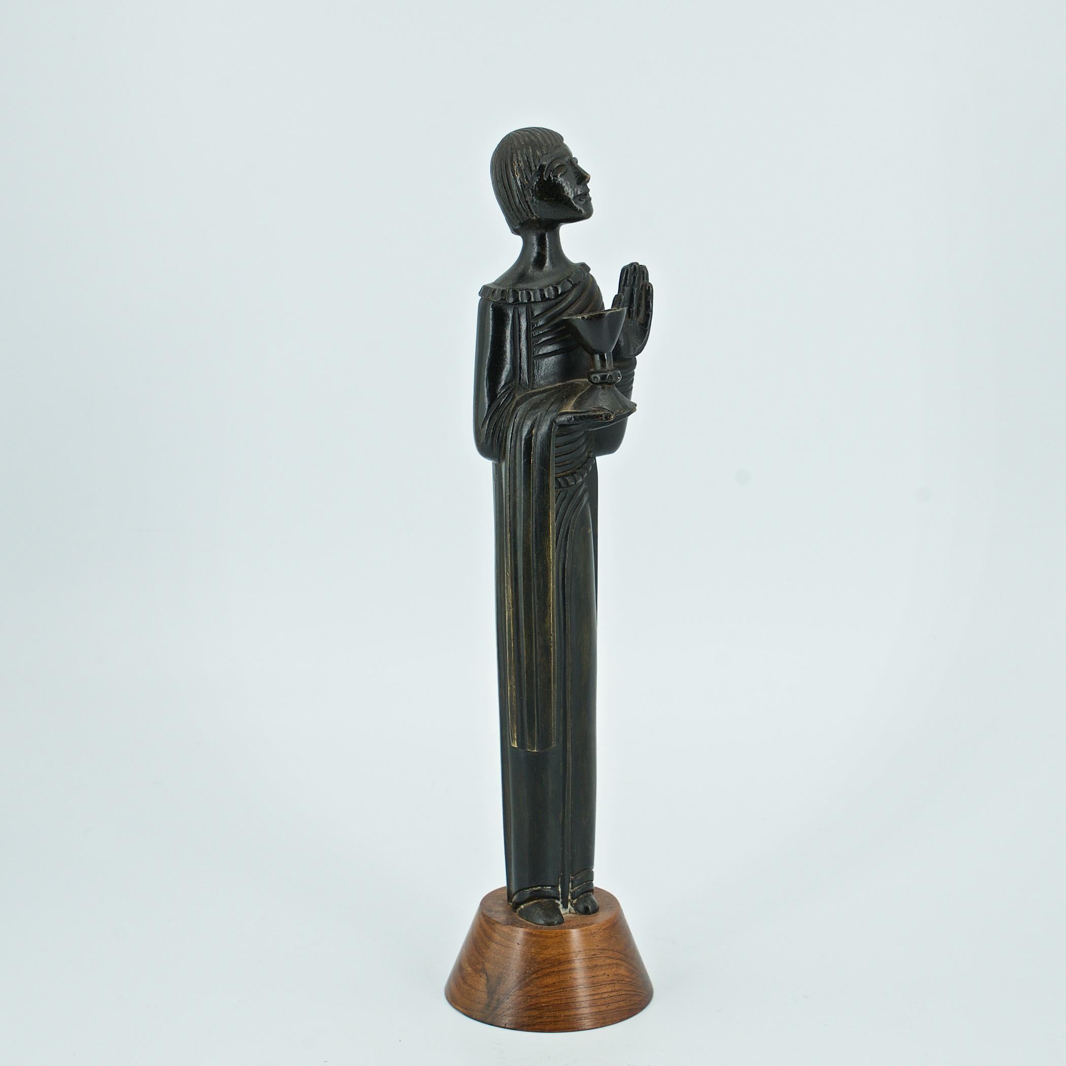 Jean Lambert-Rucki (French 1888-1967.) Patinated Bronze Statuette on hardwood plinth of St. John the Baptist. 

Retains original paper label on bottom inside from Foundry; Adalc Paris, Made in France. Wooden base is stamped, Cheret Paris. Artist